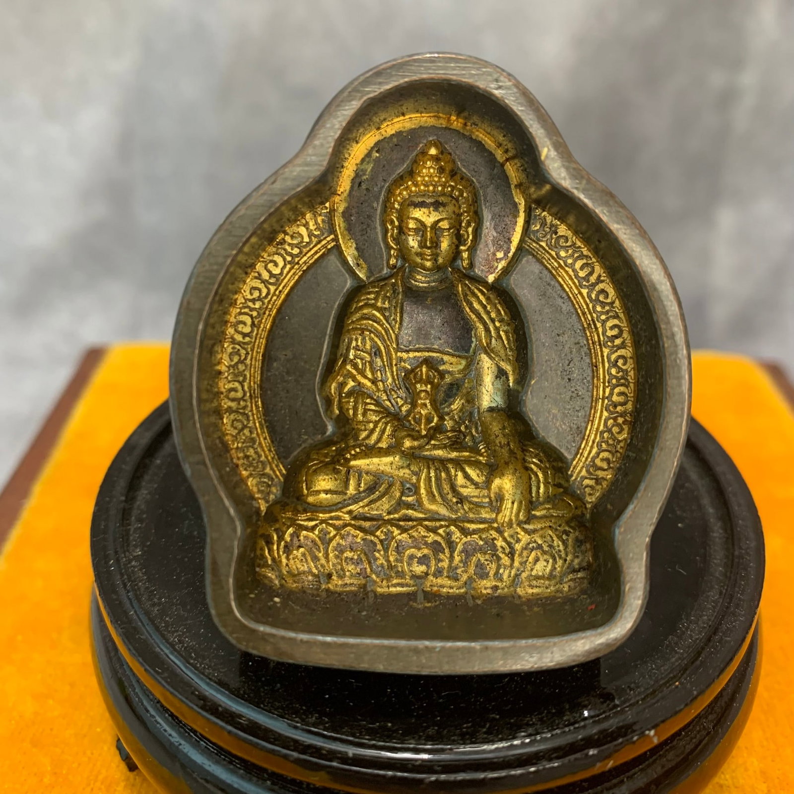 TIBETAN GILT-BRONZE SHAKYAMUNI BUDDHA MOLD: Republic Period; High: 2.1 inch; Width: 1.8 inch; Long: 1.7 inch ;Wooden base for picture and display only.