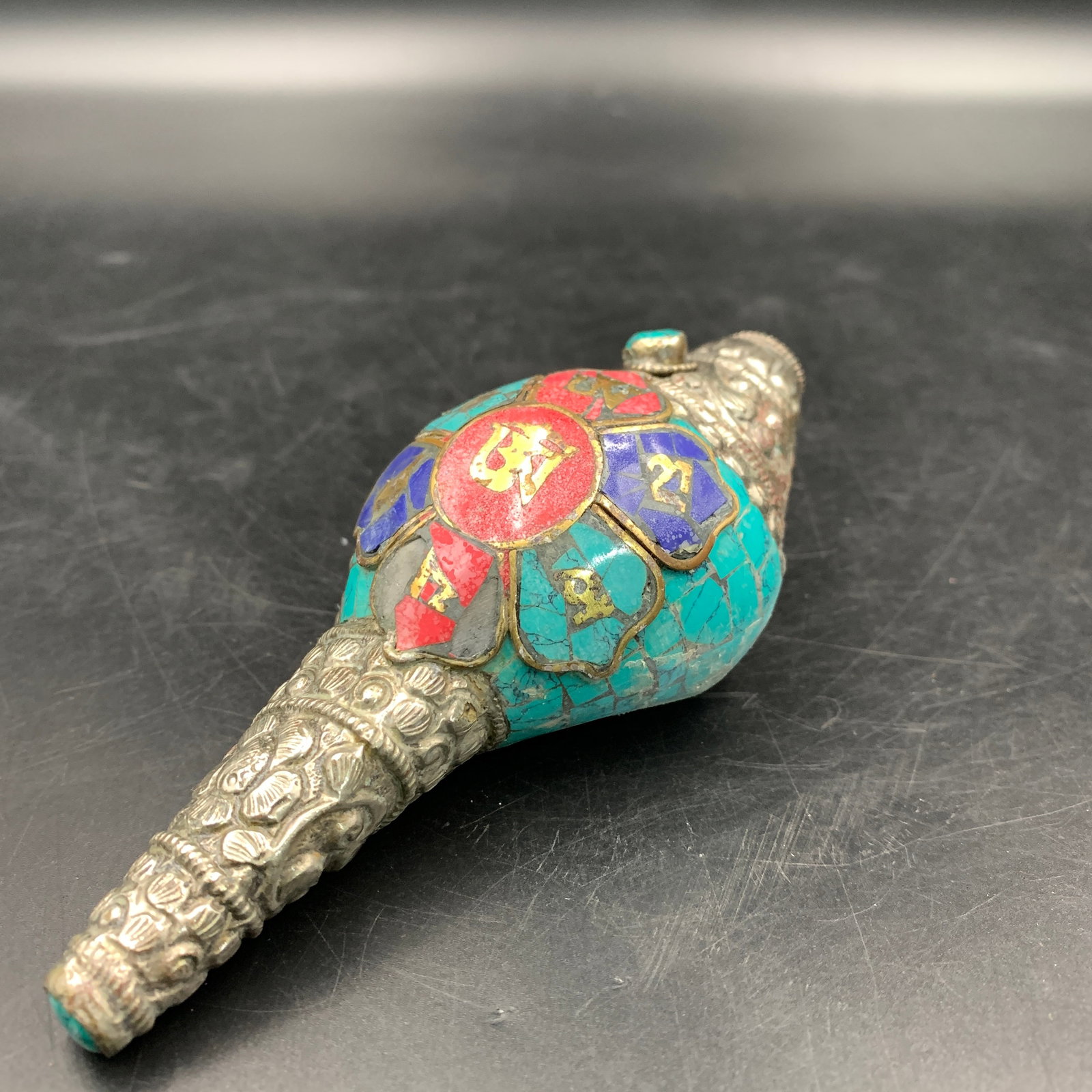 TIBETAN BUDDHIST CORAL AND TURQUOISE INLAID RITUAL CONCH SHELL: Republic Period; Long: 5.1 inch; Width: 2.3 inch; High: 1.7 inch; ;Wooden base for picture and display only.