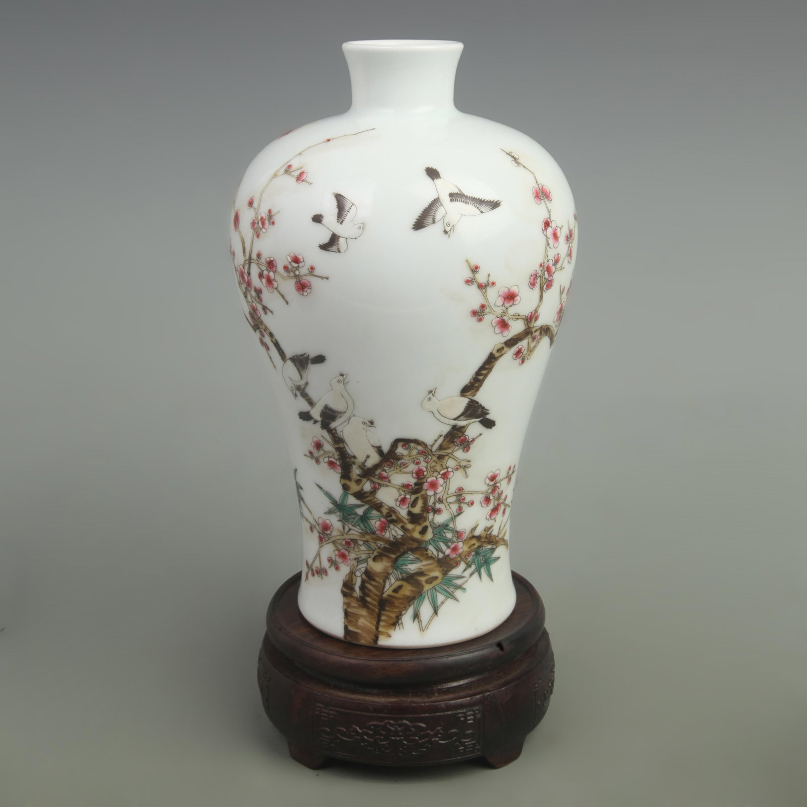 FAMILLE ROSE FLOWER AND BIRD PATTERN MEI STYLE BOTTLE: Qing Dynasty Yong Zheng Period; High: 10.6 inch; Width: 5 inch; ;Wooden base for picture and display only.