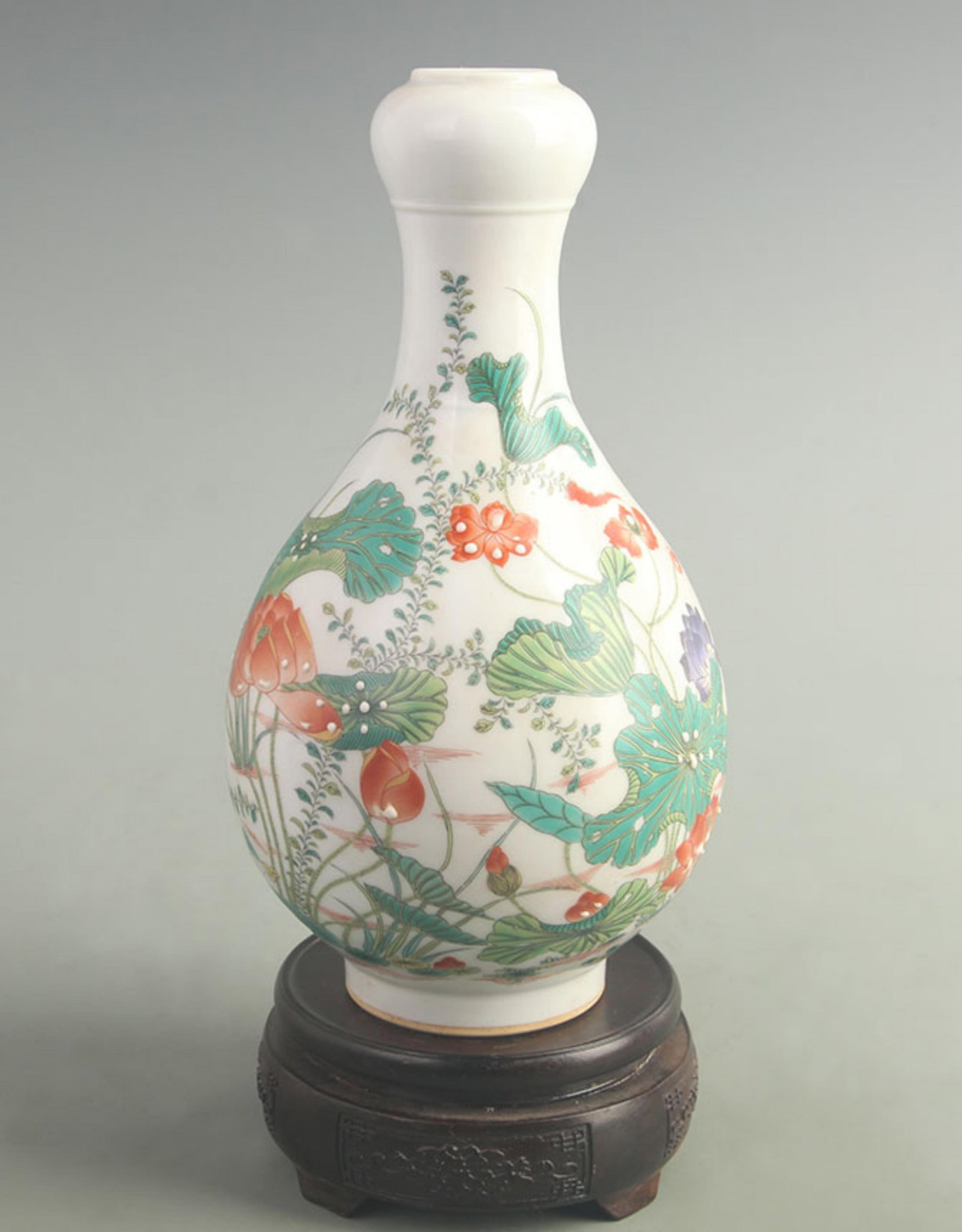 FAMILLE ROSE GROUND LOTUS PATTERN GARLIC HEAD PORCELAIN VASE: Qing Dynasty Qian Long Period; High: 10.0 inch; Width: 5.00 inch ;Wooden base for picture and display only.