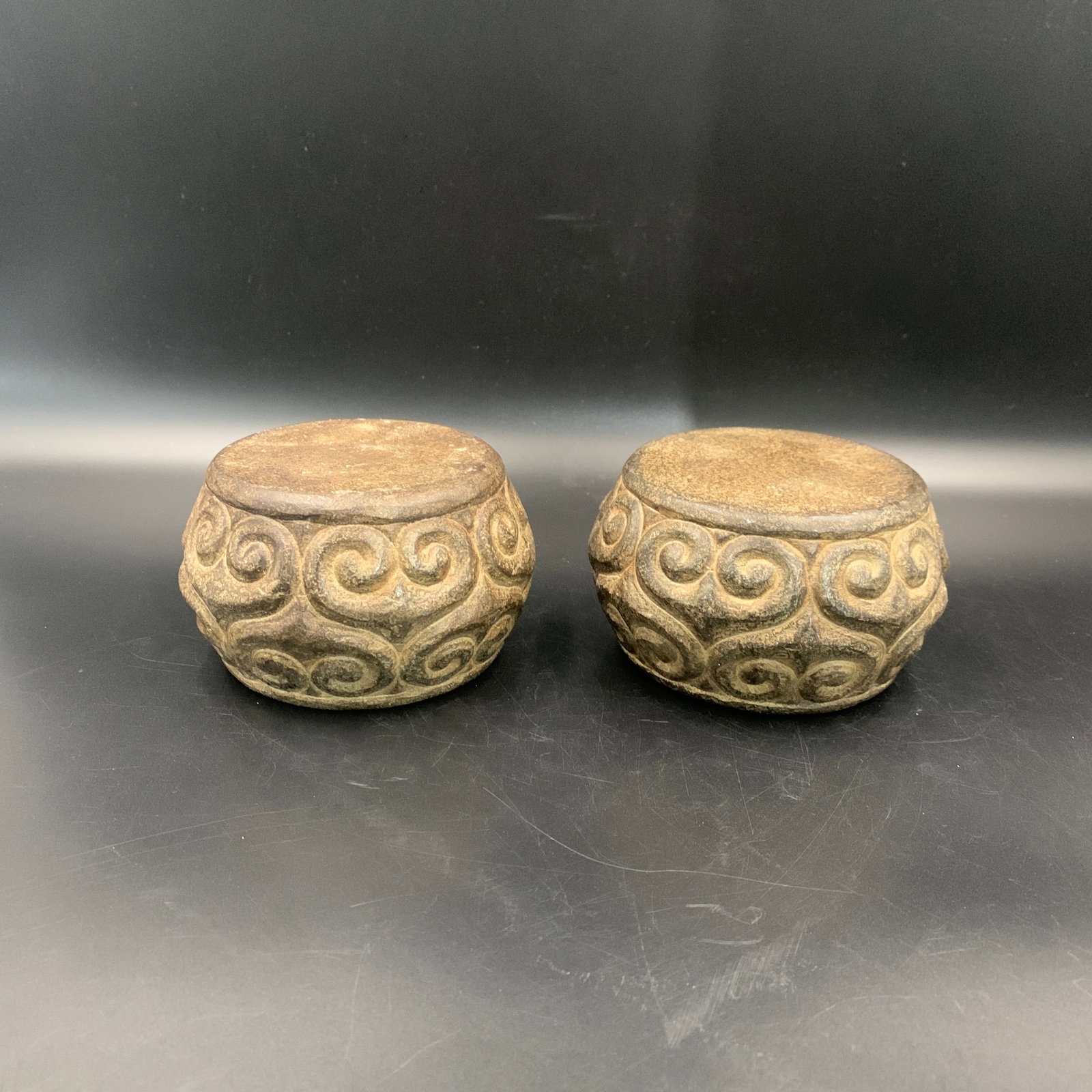 PAIR OF CARVED STONE CLOUD-SCROLL PATTERN BASES - 2