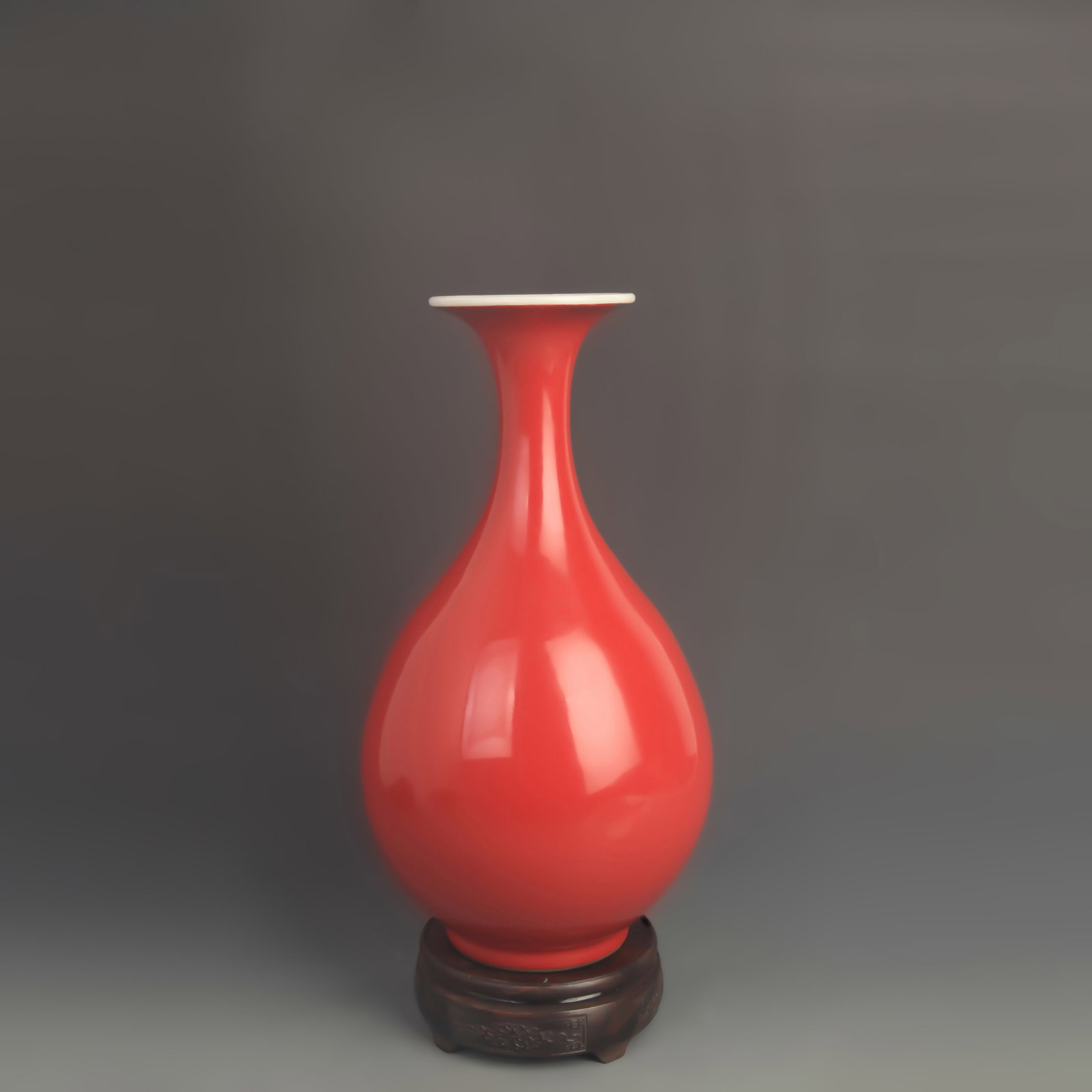 JIHONG RED-GLAZED YUHUCHUN PORCELAIN VASE: Qing Dynasty Qian Long Period;High: 14.5 inch;Diameter: 7.50 inch ;Wooden base for picture and display only.