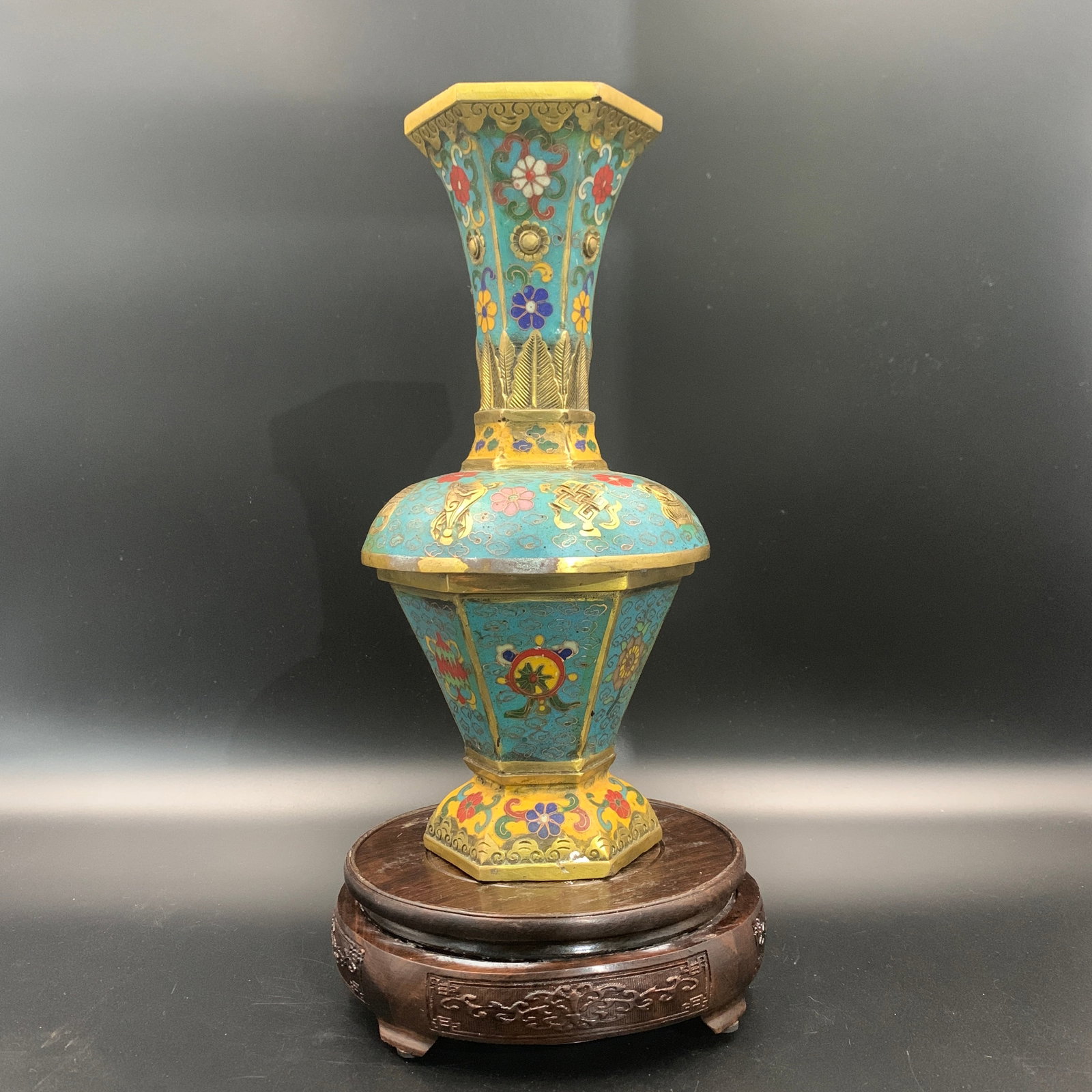 CLOISONNE ENAMEL HEXAGONAL GU-FORM VASE WITH EIGHT TREASURES: Qing Dynasty; High: 11.1 inch; Diameter: 5.3 inch; ;Wooden base for picture and display only.