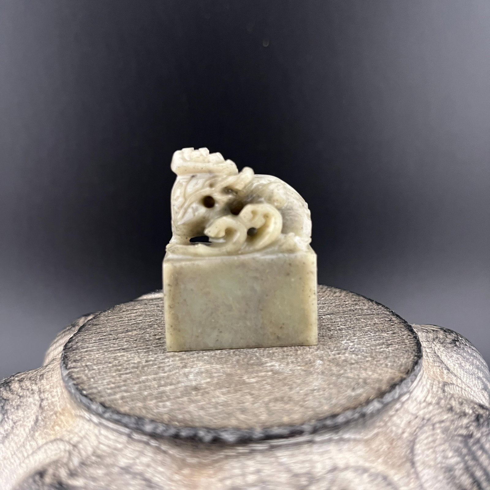 SMALL CARVED SHOUSHAN STONE QILIN-FORM SQUARE SEAL: Modern; Long: 1.1 inch; Width: 0.6 inch; High: 1.5 inch; ;Wooden base for picture and display only.