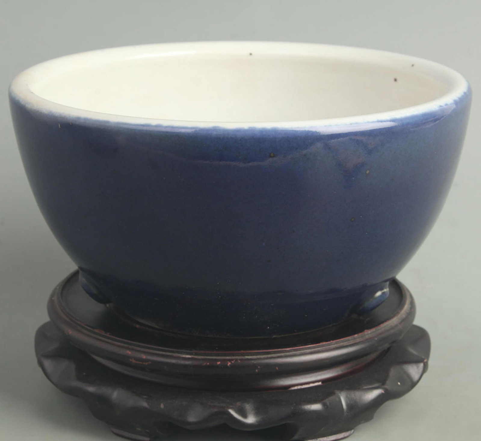 A MUSTARD-GREEN-GLAZED BRUSH WASHER: Qing Dynasty; High: 4.30 inch; Diameter: 8.80 inch ;Wooden base for picture and display only.