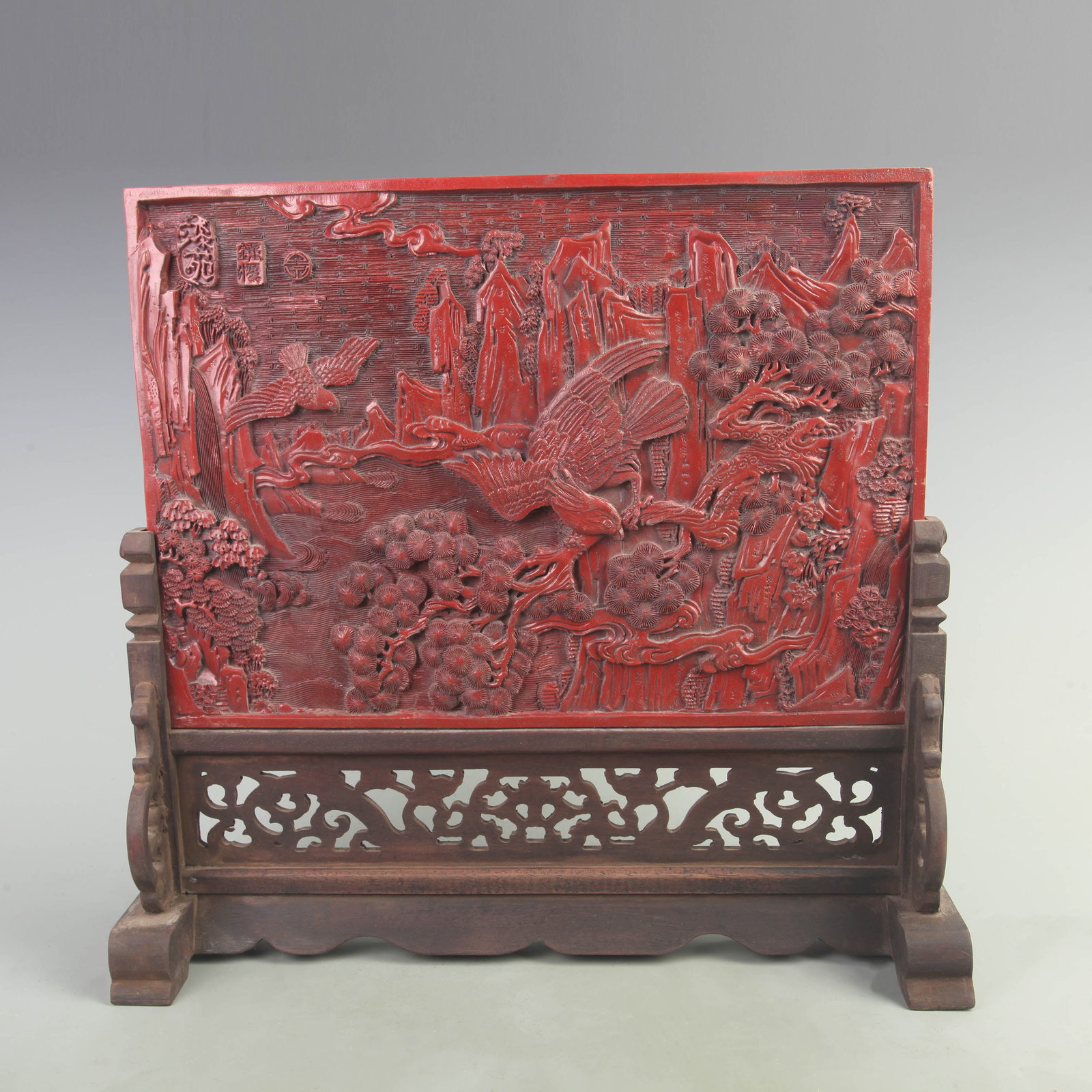 RARE RED CARVED LACQUER FLOWER AND BIRD PATTERN TABLE SCREEN: Qing Dynasty; High: 15.5 inch; Width: 0.2 inch; Long: 14.8 inch; ;Wooden base for picture and display only.