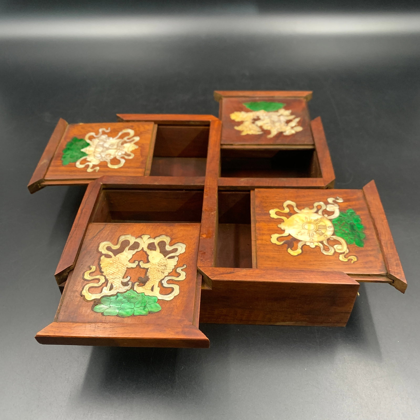 HARDWOOD FOUR-COMPARTMENT SWIVEL PUZZLE BOX WITH MOTHER-OF-PEARL INLAY: Republic Period; Long: 7.5 inch; Width: 7.5 inch; High: 1.9 inch; ;Wooden base for picture and display only.
