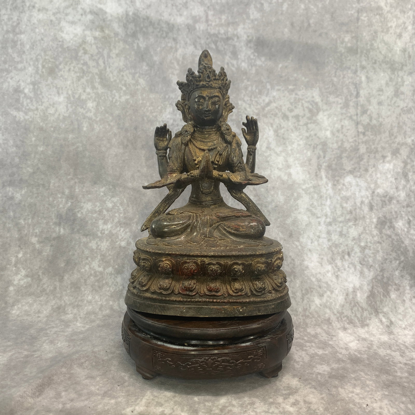 A TIBETAN-STYLE BRONZE FIGURE OF FOUR-ARMED SHADAKSHARI LOKESHVARA: Ming Dynasty Style; Long: 6.3 inch; Width: 4.6 inch; High: 9.8 inch; ;Wooden base for picture and display only.