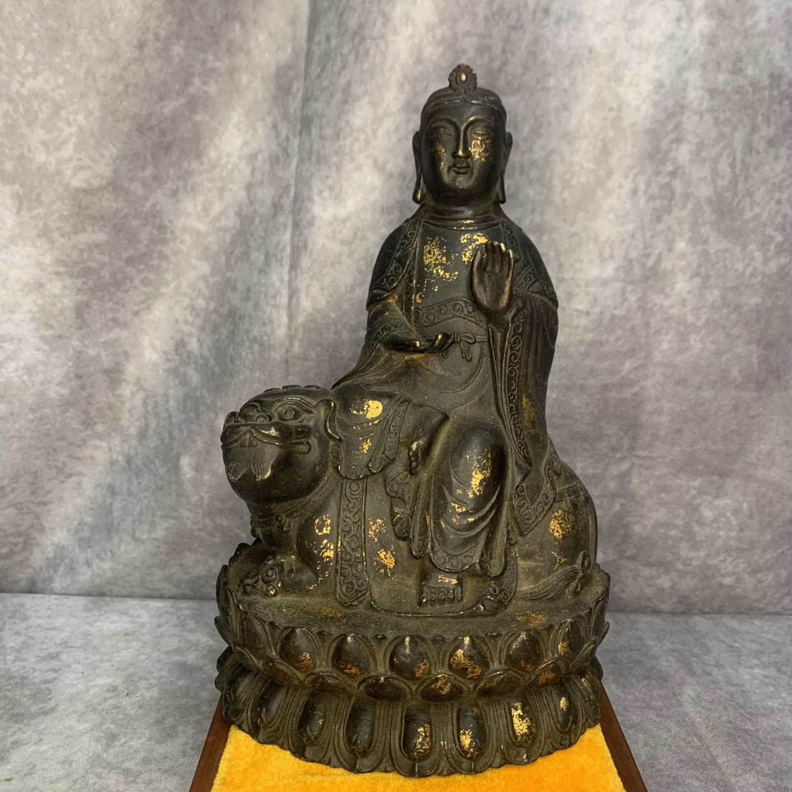 A FINE GILT-BRONZE FIGURE OF MANJUSHRI OR SAMANTABHADRA, TIBETAN BUDDHISM: Qing Dynasty; High: 10.0 inch; Width: 6.3 inch; Long: 4.7 inch ;Wooden base for picture and display only.
