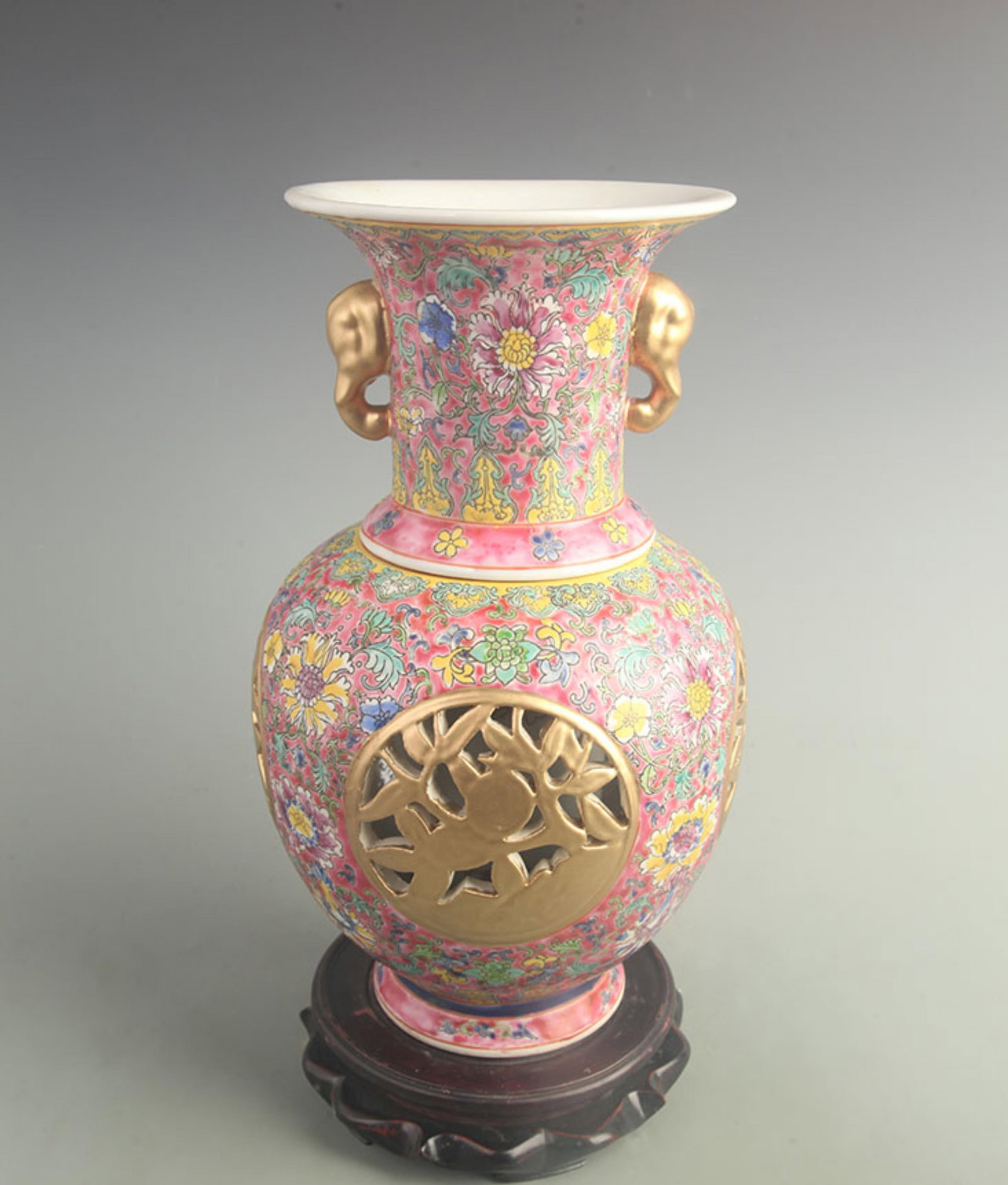 ROUGE RED COLOR FOUR SIDED CARVED INNER REVOLVING PORCELAIN VASE: Qing Dynasty Qian Long Period; High: 13.5 inch; Width: 6.50 inch; ;Wooden base for picture and display only.