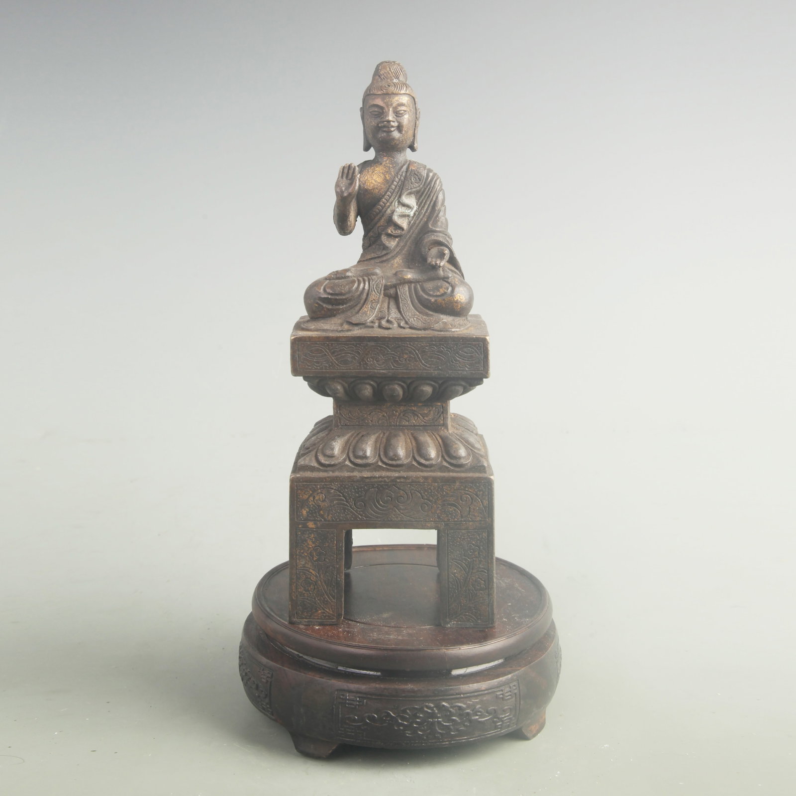 A GILT BRONZE SHAKYAMUNI BUDDHA