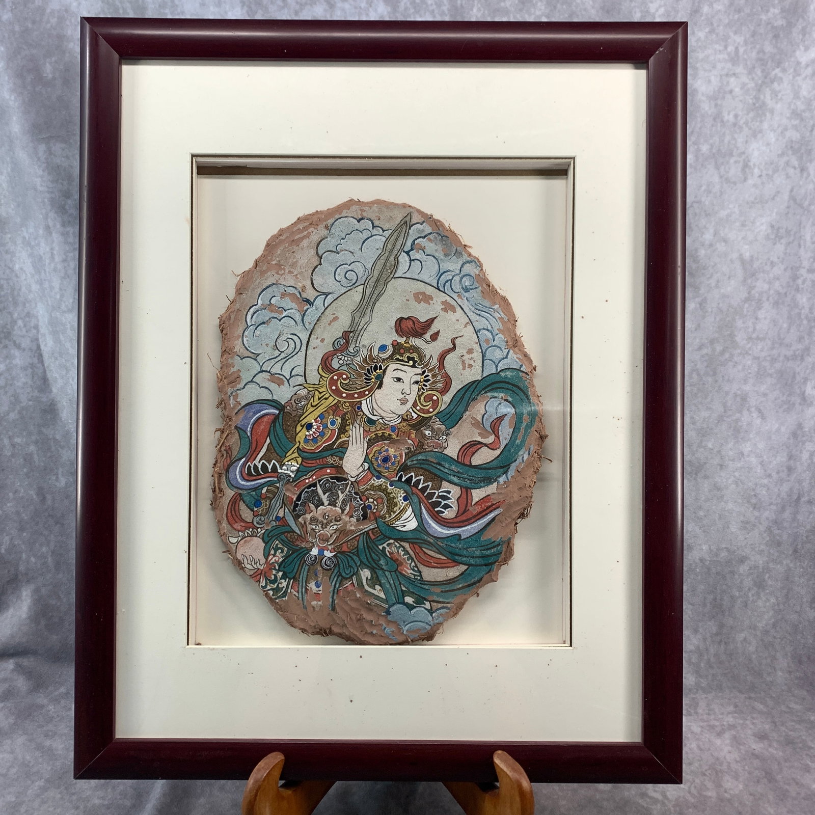 A FINE FRAMED MANJUSHRI BODHISATTVA PAINTING ON MUD WALL