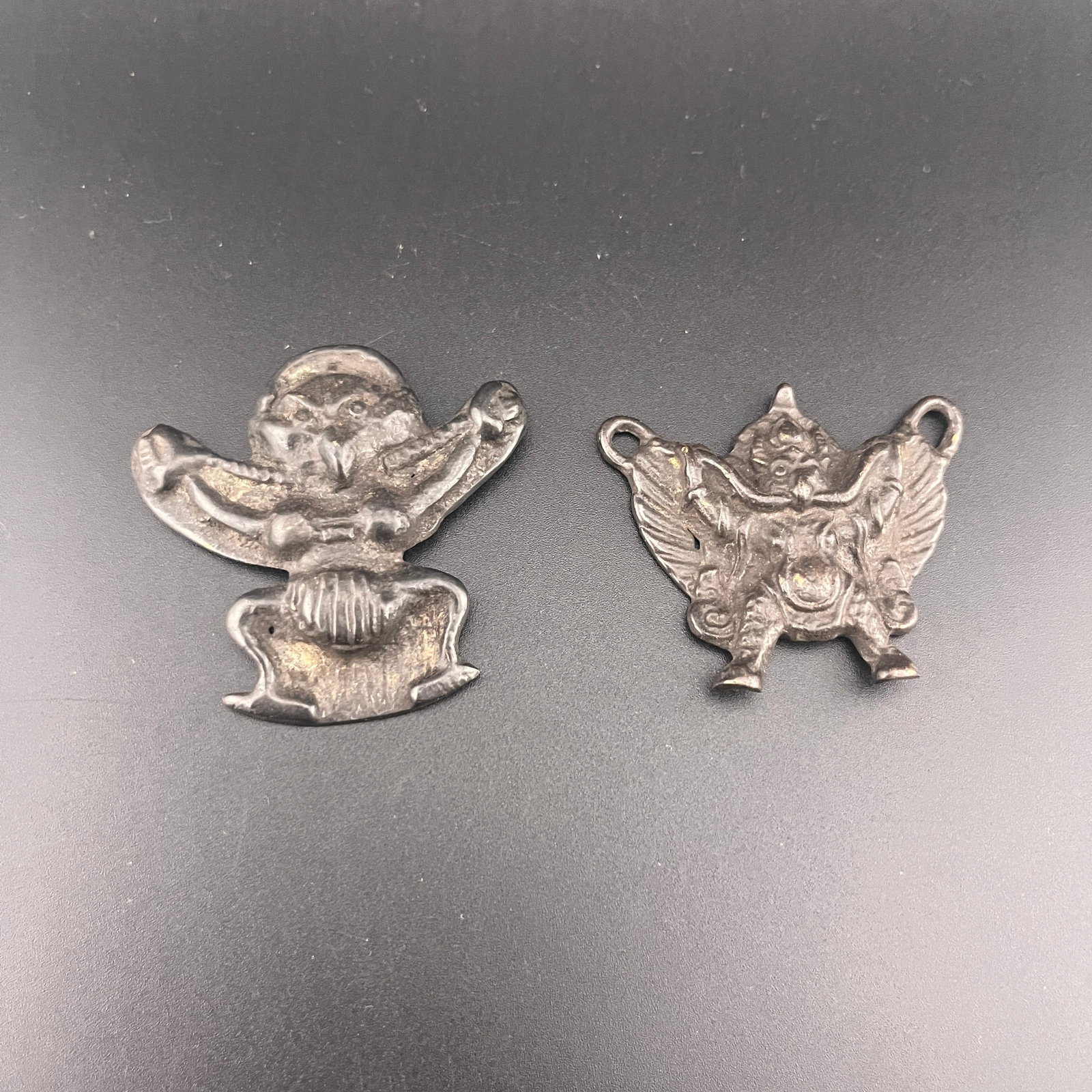 HIMALAYAN MINIATURE CAST BRONZE GARUDA PENDANTS