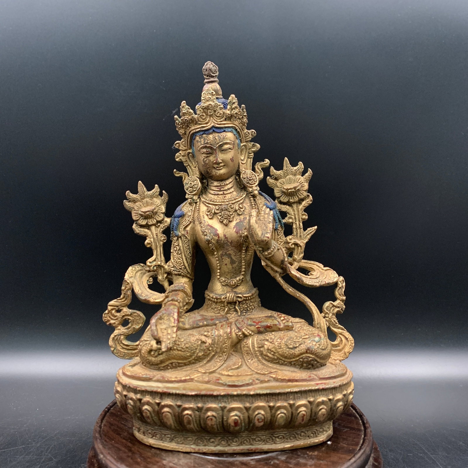 RARE GILT BRONZE WHITE TARA STATUE: Qing Dynasty; Long: 5.8 inch; Width: 3.2 inch; High: 8.3 inch; . Wooden base for display only