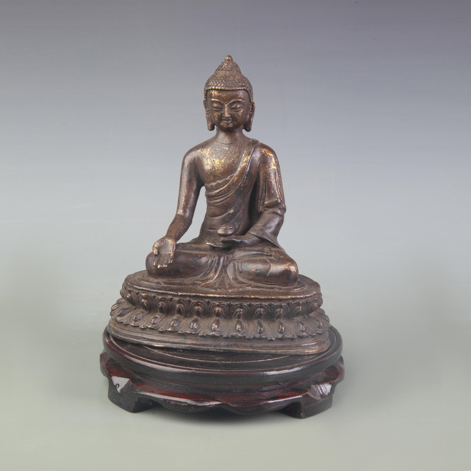 A FINE BRONZE SHAKYAMUNI BUDDHA STATUE: 20th Century; High: 7.6 inch. Wooden base for display only