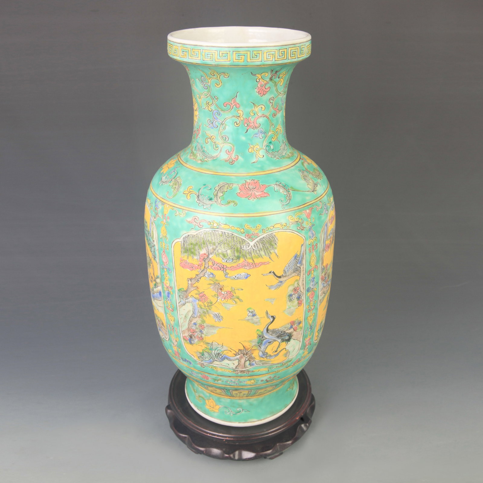 LARGE GREEN-GROUND FAMILLE-ROSE ANIMAL PORCELAIN VASE