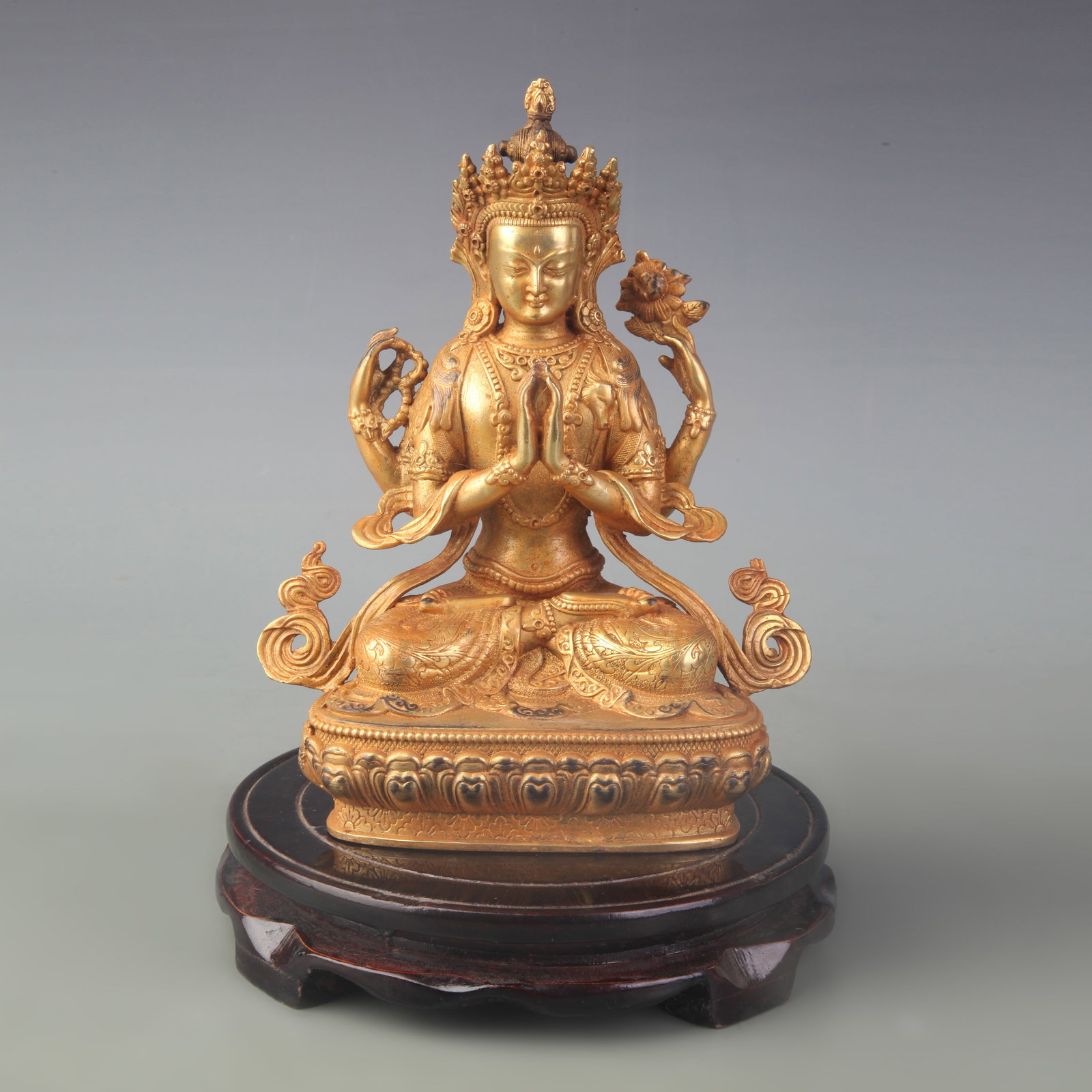 TIBETAN GILT BRONZE STATUE OF FOUR-ARMED AVALOKITESHVARA STATUE: Qing Dynasty; High: 8.0in. Wooden base for display only