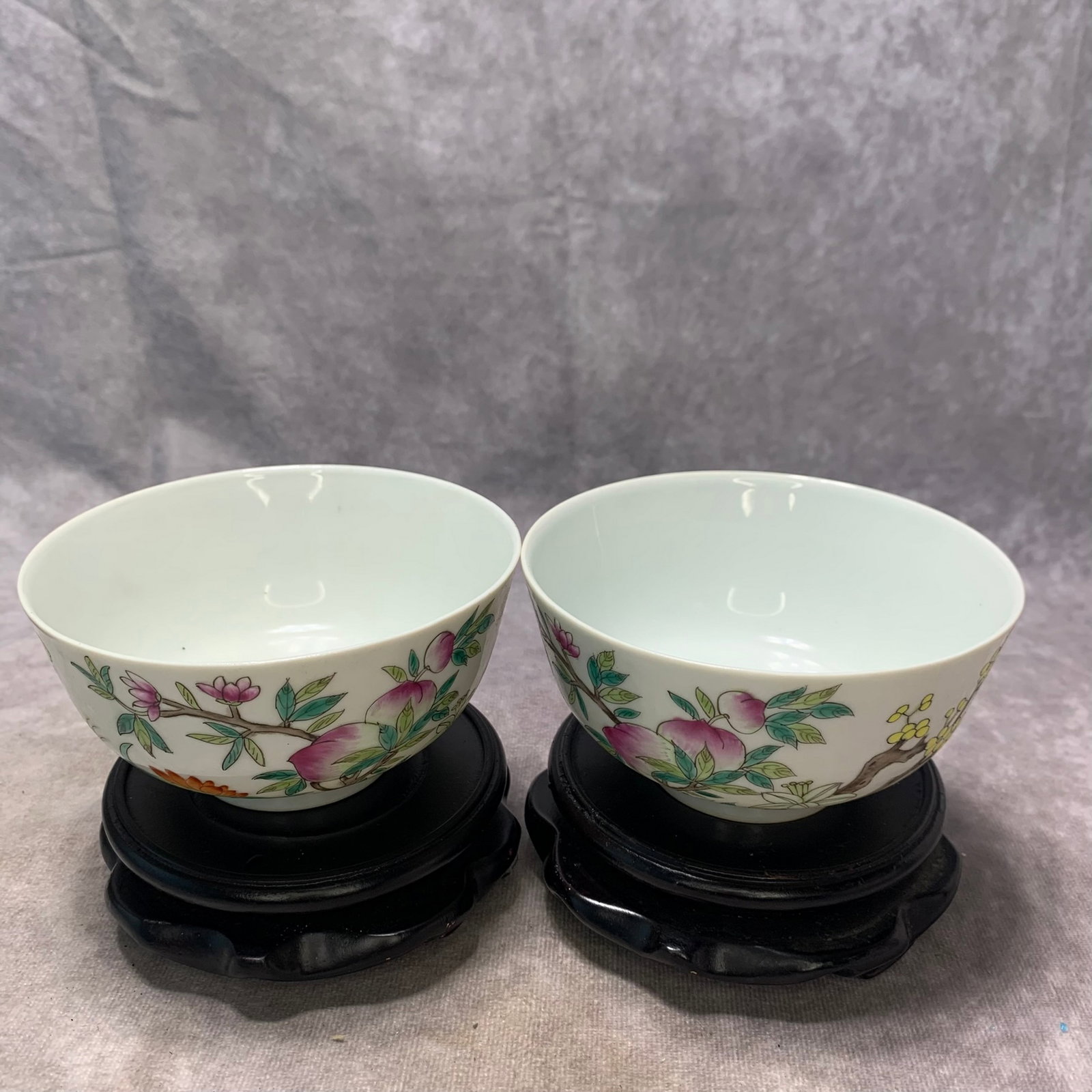 PAIR OF FAMILLE ROSE SMALL BOWLS WITH FORTUNE-AND-LONGEVITY MOTIF, GUANGXU MARK: Qing Dynasty; High: 2.5 inch; Diameter: 4.5 inch; . Wooden base for display only