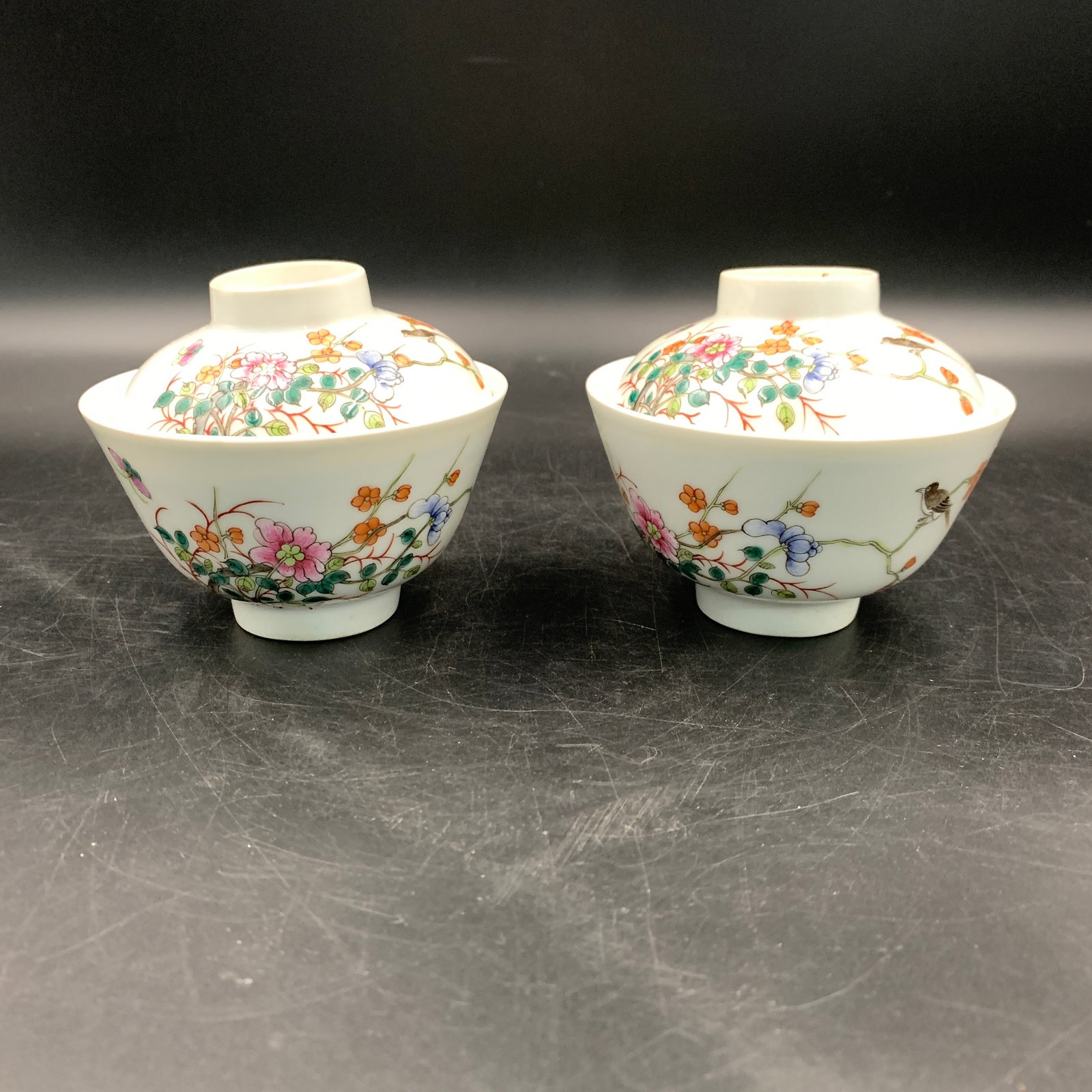 PAIR OF FAMILLE ROSE "BIRD AND FLOWER" GAIWAN TEACUPS