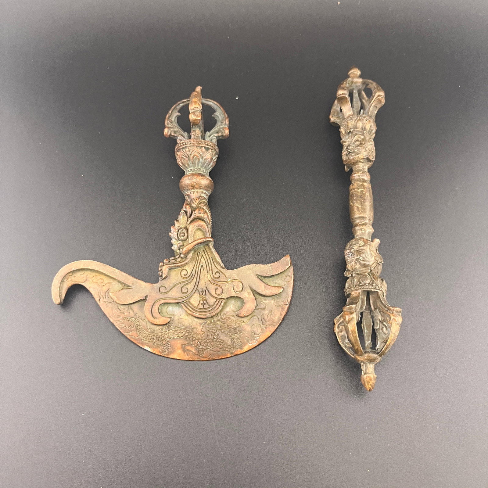 TIBETAN RITUAL BRONZE KARTIKA (FLAYING KNIFE) & PHURBA (DAGGER) PAIR: Qing Dynasty; Long: 6.3 inch; Width: 1.1 inch; Long: 4.9 inch; Width: 3.9 inch; High: 1.2 inch; . Wooden base for display only