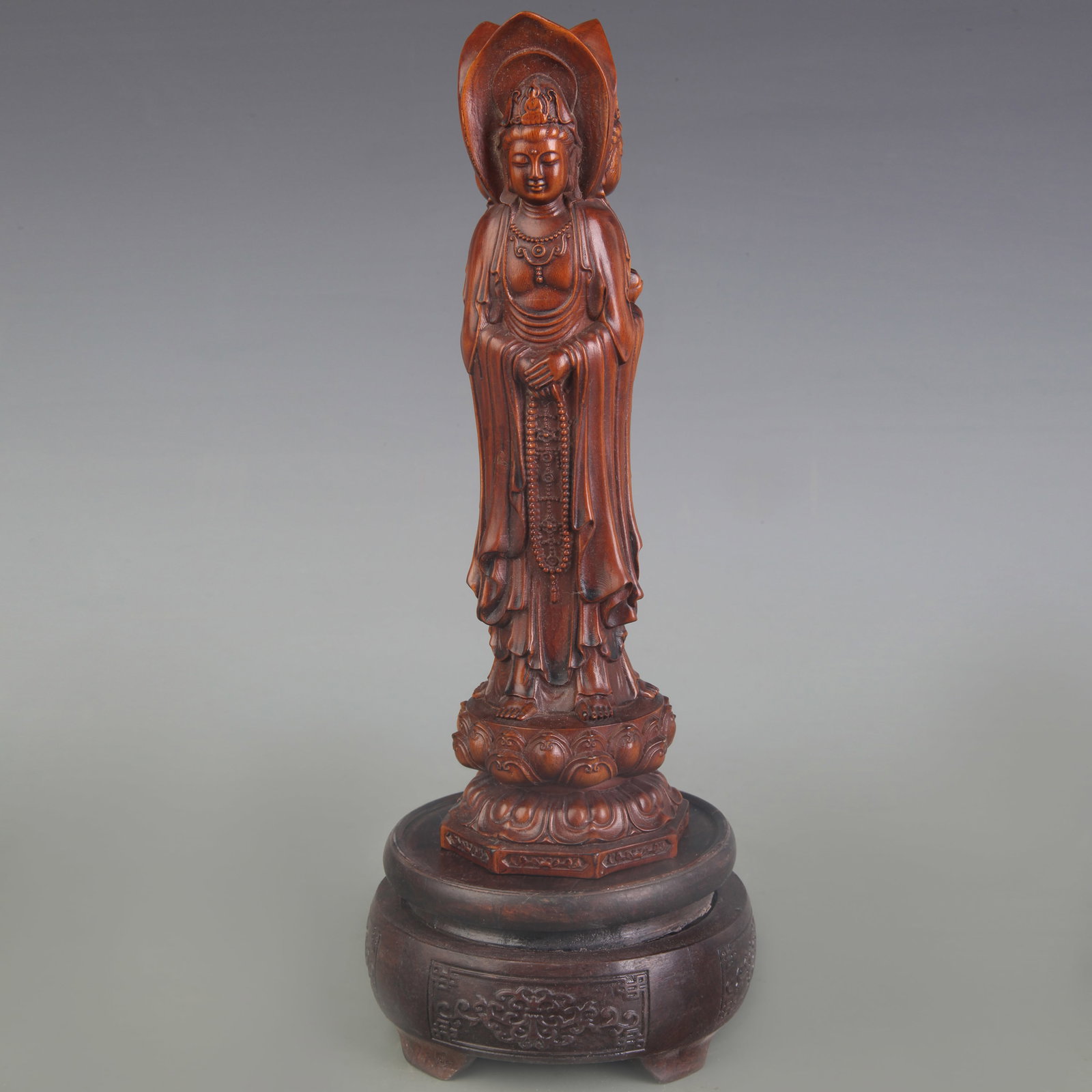 THREE-FACED GUANYIN WOOD STATUE: Qing Dynasty; High: 7.8 in. Wooden base for display only