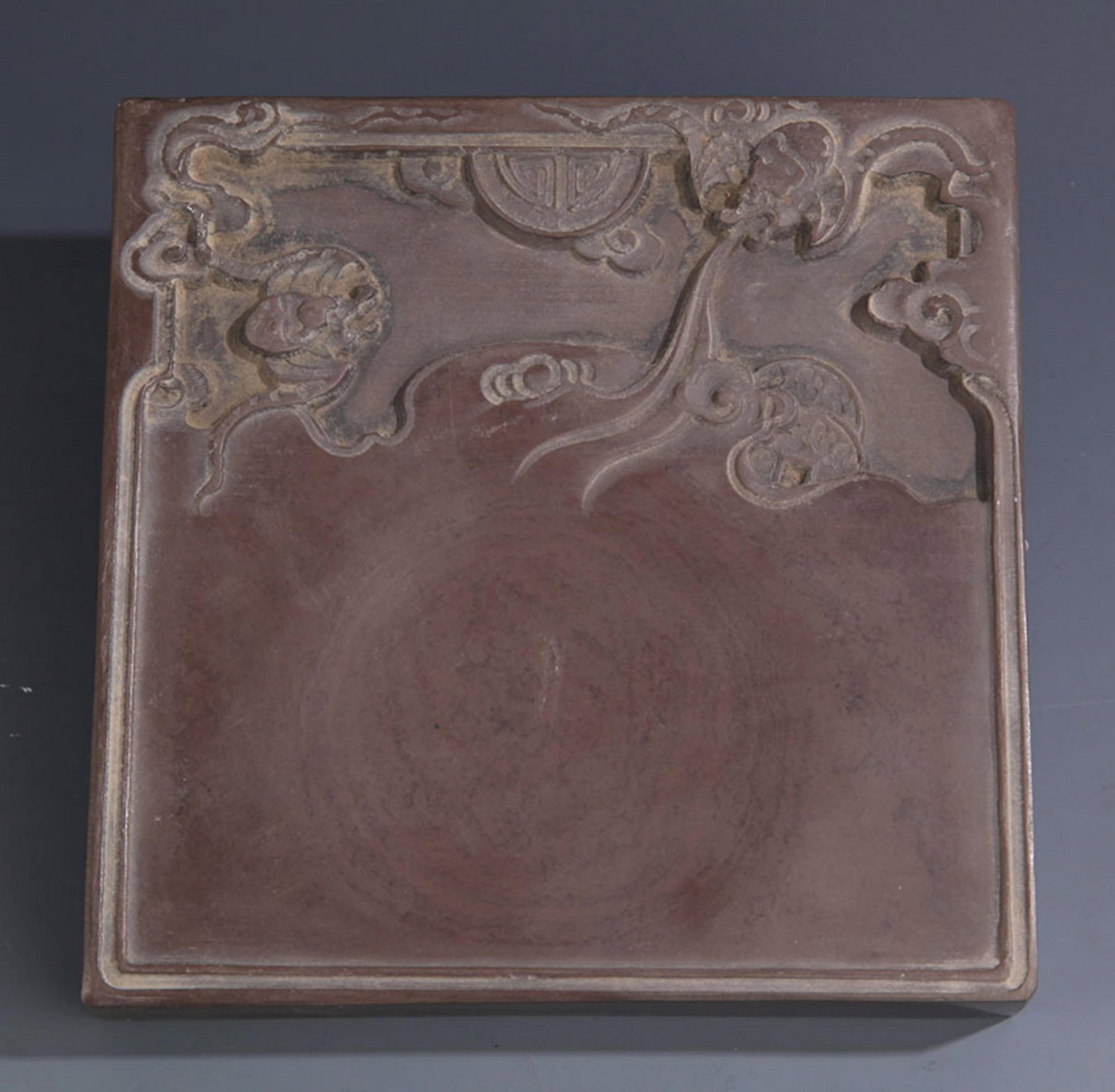 A FINE BAT AND DRAGON CARVING STONE INK: Qing Dynasty; Long: 6.25 inch High: 6.25 inch . Wooden base for display only