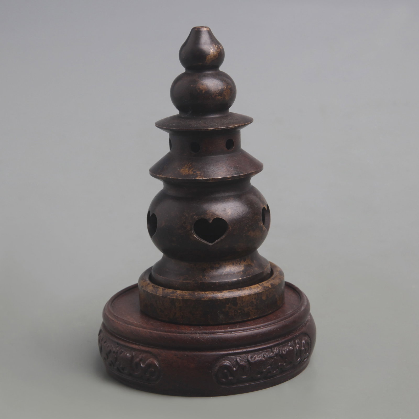 PAGODA-FORM BRONZE INCENSE BURNER: Ming Dynasty Style; D: 4.8inch; High: 2.5inch. Wooden base for display only