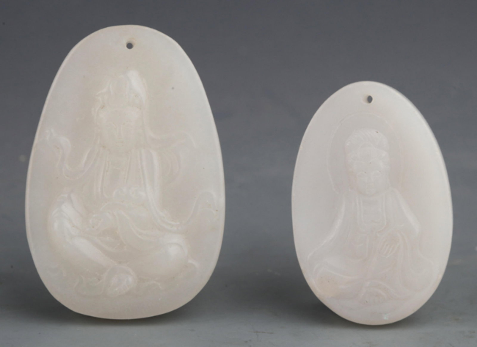 GROUP OF TWO GUAN YIN PATTERN JADE PENDANT