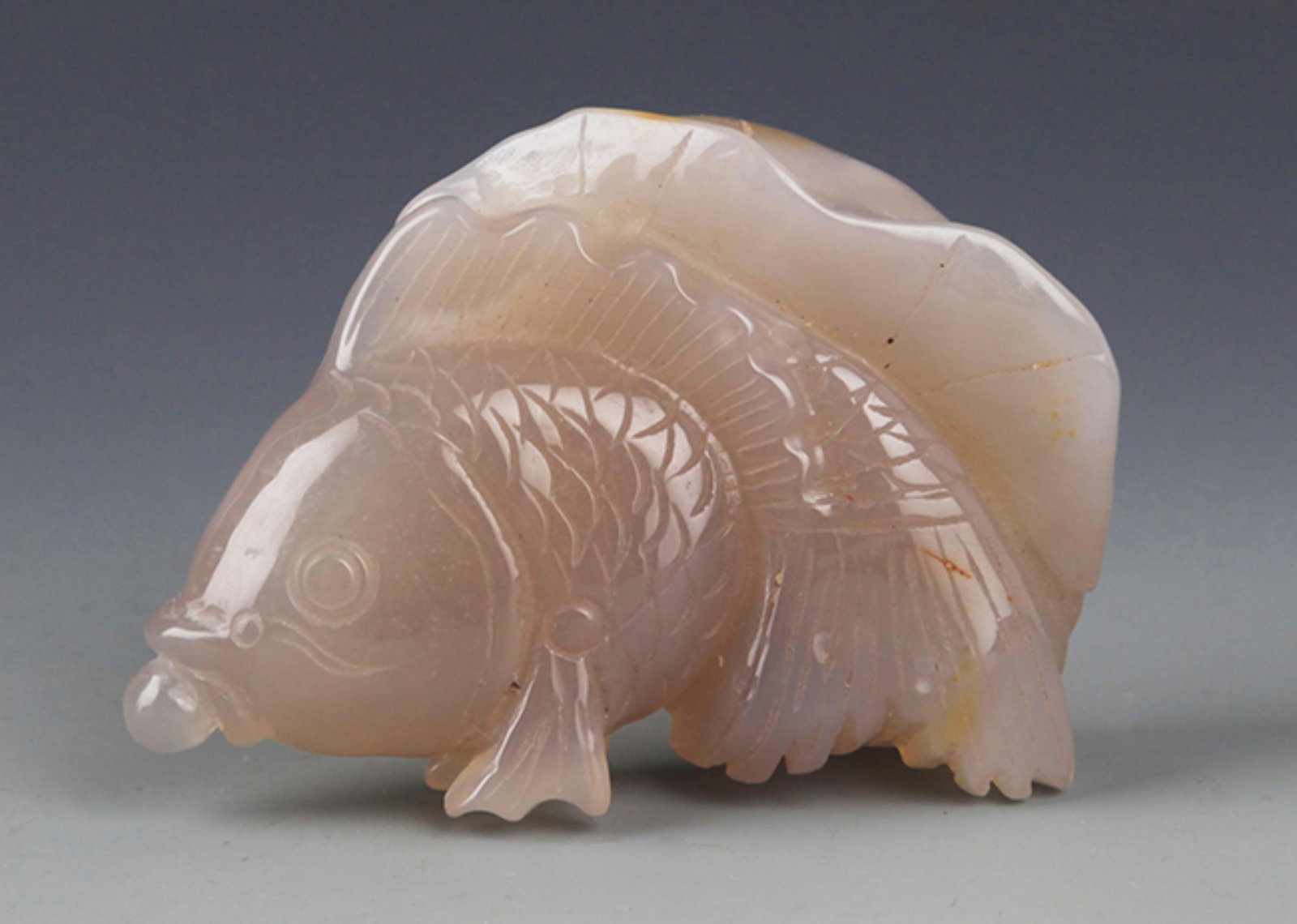 A LARGE FISH FIGURE JADE DECORATION: 20th Century; Long: 4.00 inch; Width: 2.5 inch; . Wooden base for display only
