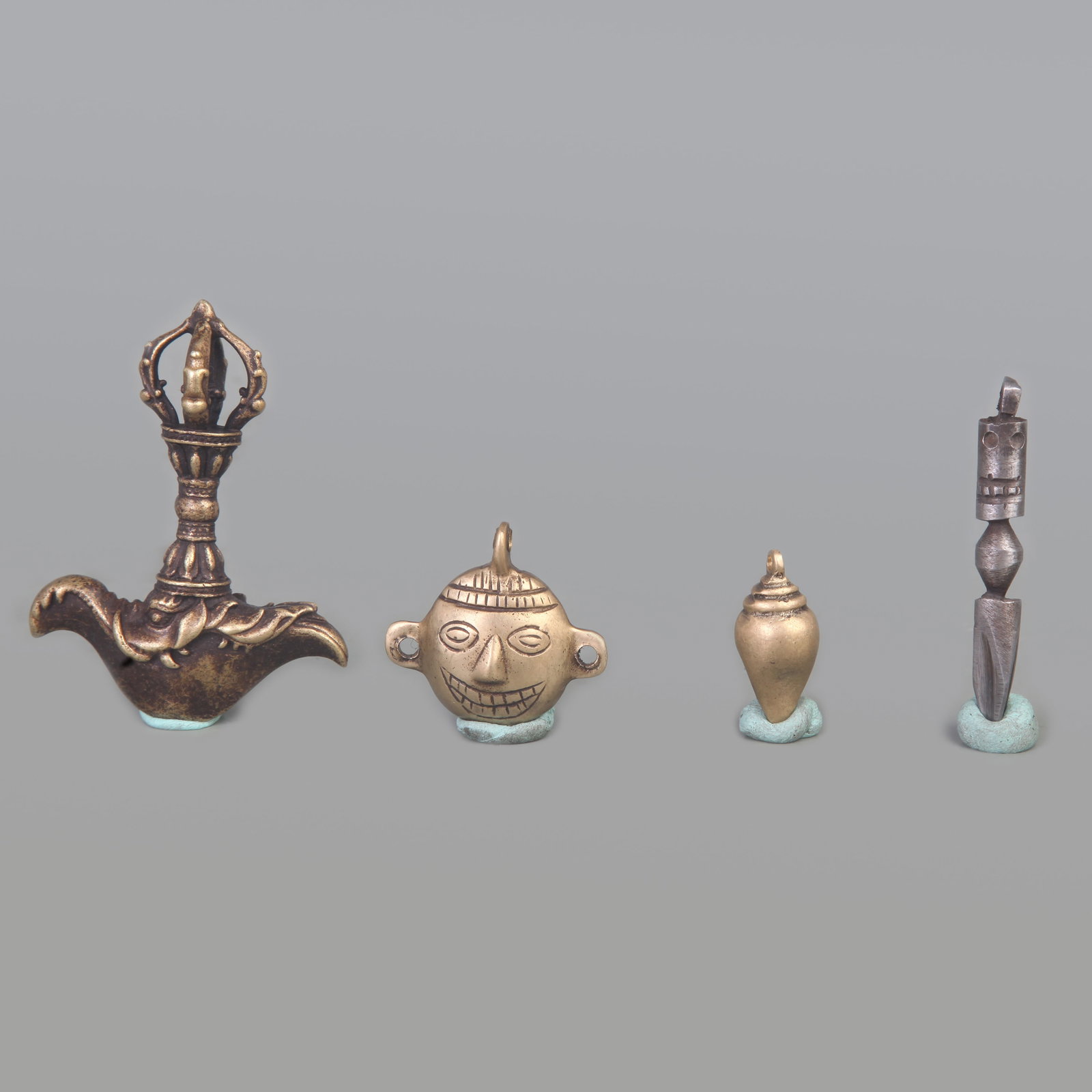 TIBETAN BUDDHISM BUDDHA STATUES AND RITUAL OBJECTS: Qing Dynasty; Long: 2.8-1.5 inch; Size Various. Wooden base for display only