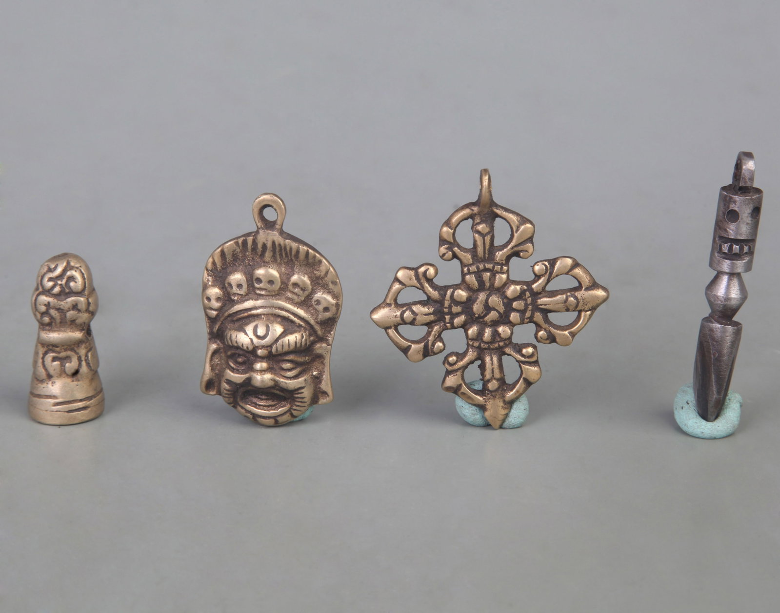 GROUP OF TIBETAN BUDDHISM INSTRUMENTS PHURBA: Qing Dynasty; Long: 2.2 inch to 1.2 inch; . Wooden base for display only