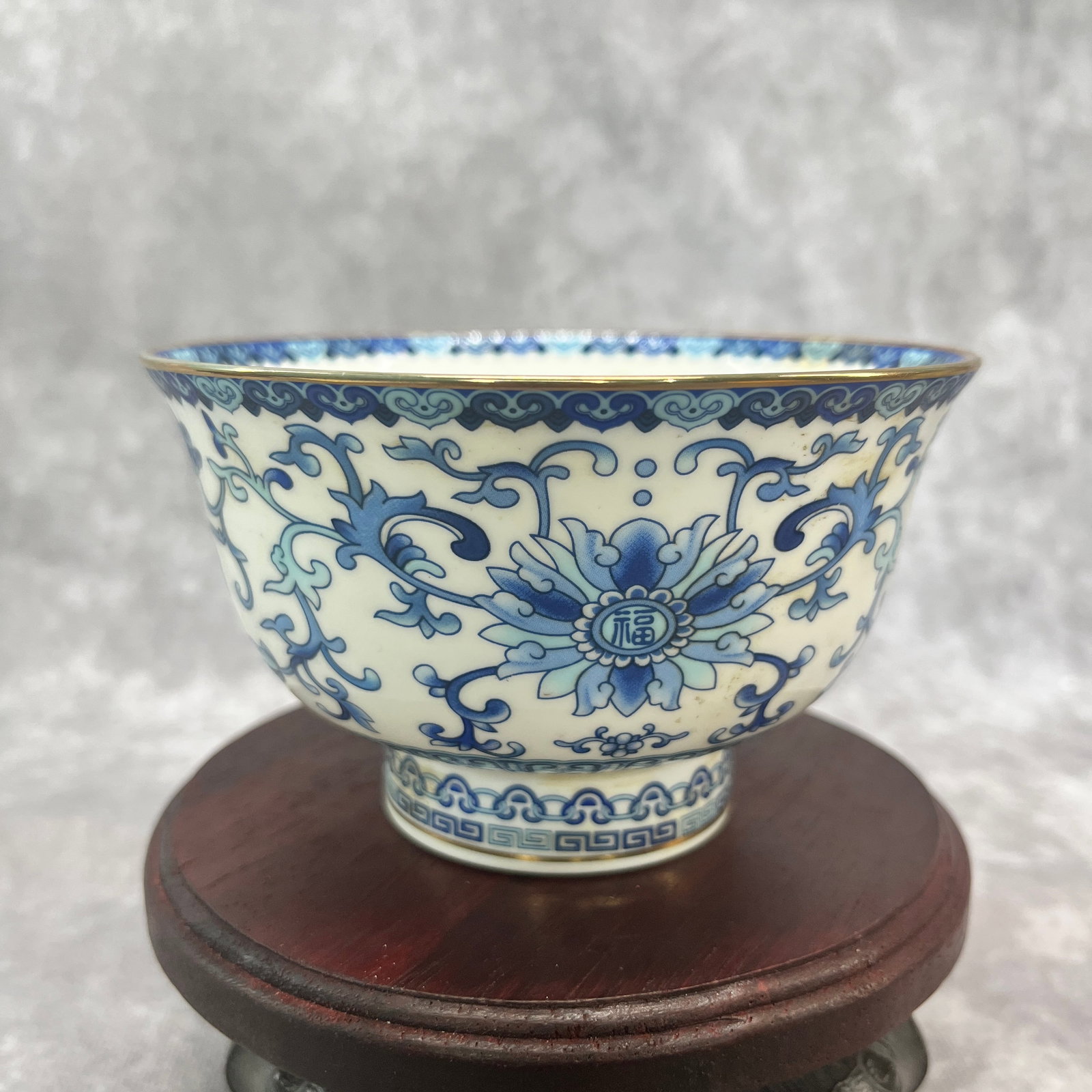 BLUE AND WHITE "FU" CHARACTER PORCELAIN BOWL: Qing Dynasty; High: 2.9 inch; Diameter: 4.8 inch; . Wooden base for display only