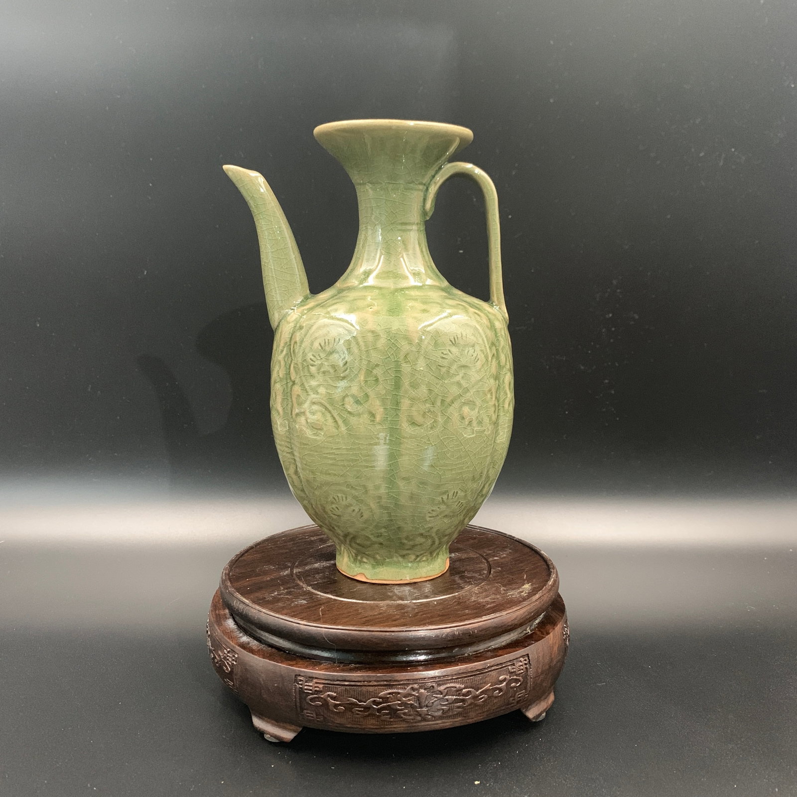 CELADON EWER WITH CARVED FLORAL MOTIFS