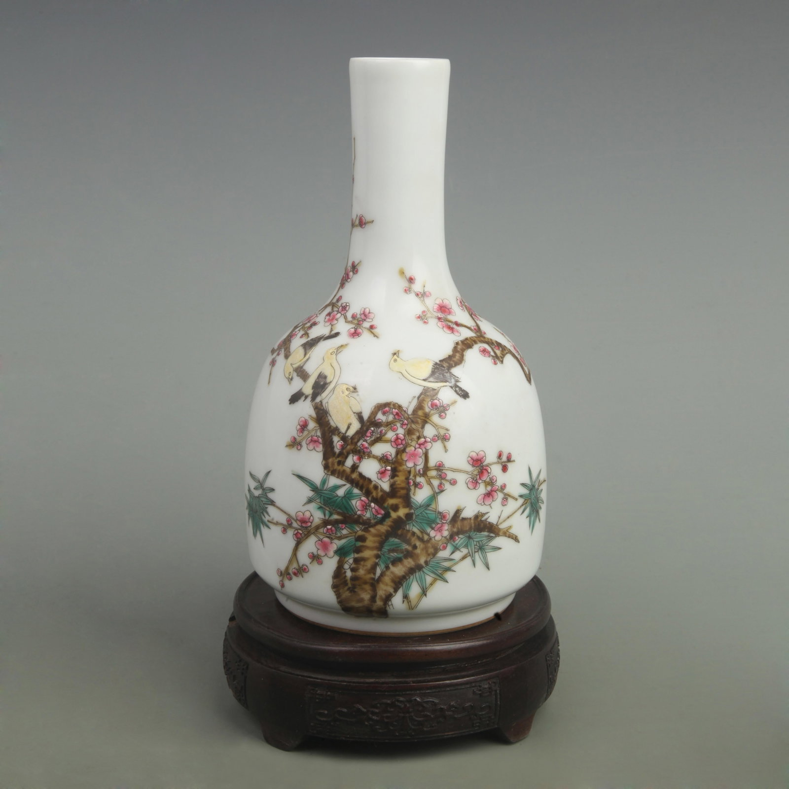 RARE FAMILLE ROSE PLUM FLOWER PATTERN BELL SHAPED BOTTLE: Qing Dynasty Qian Long Period; High: 8.6 inch; Diameter: 5 inch; . Wooden base for display only