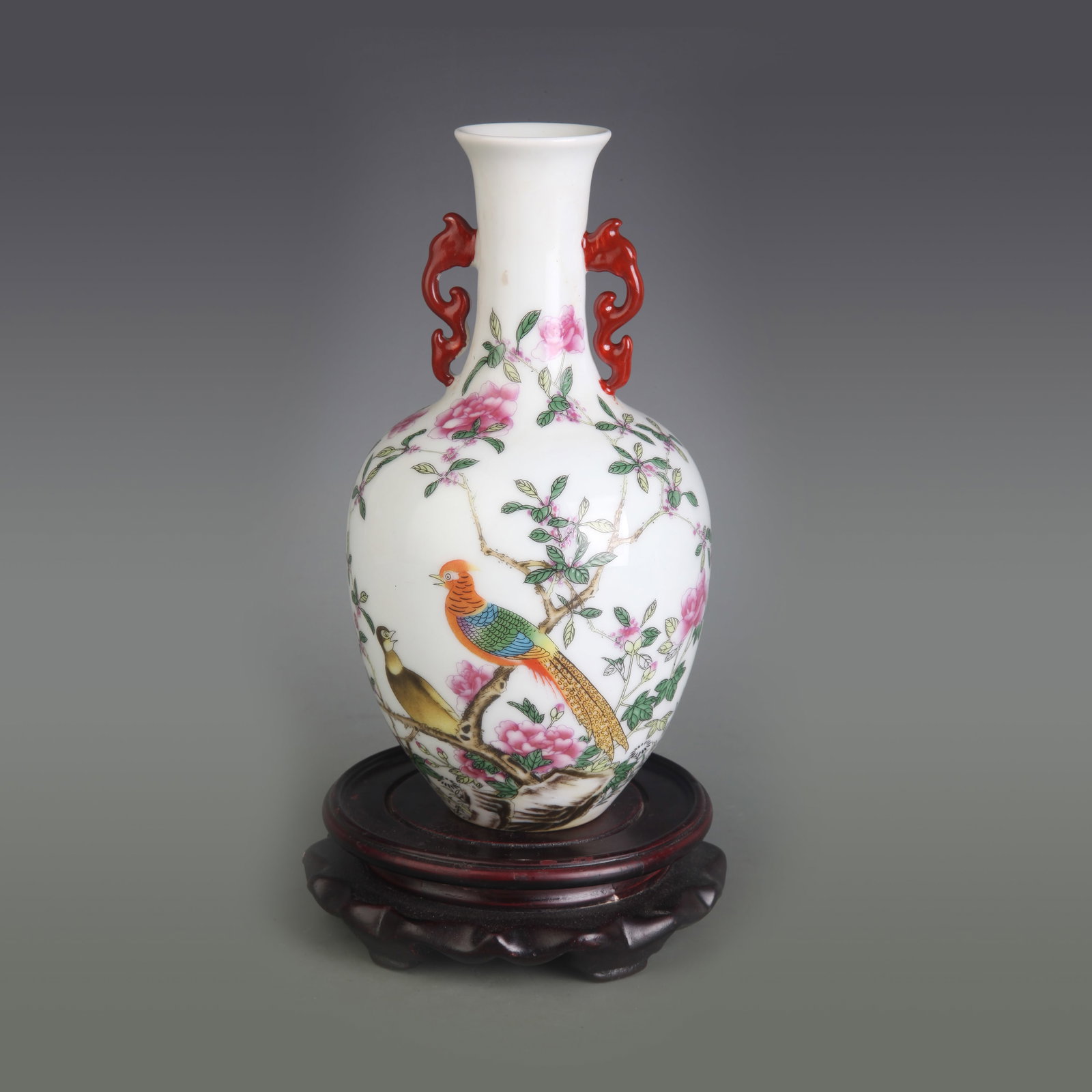 FAMILLE ROSE PORCELAIN VASE WITH BIRD AND FLOWER MOTIFS AND TWIN EARS: Qing Dynasty Qianlong Period; Diameter: 1.8 inch; High: 8.0 inch; . Wooden base for display only