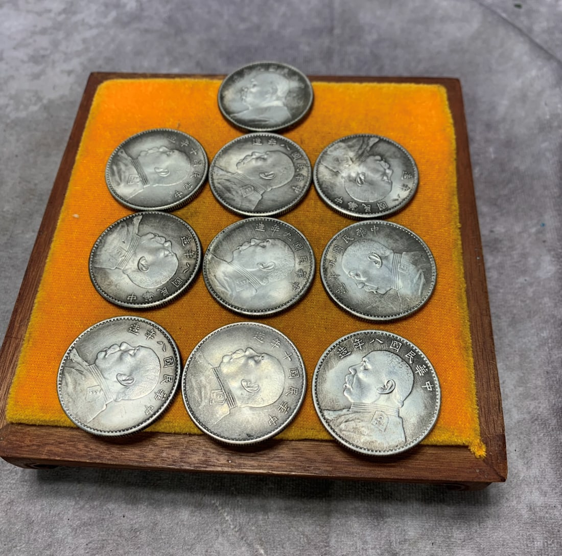 REPUBLIC OF CHINA YUAN SHIKAI PORTRAIT SILVER COINS, A GROUP OF TEN