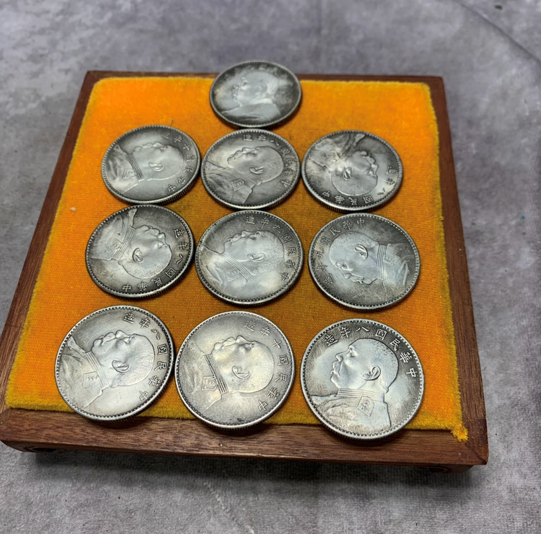 REPUBLIC OF CHINA YUAN SHIKAI PORTRAIT SILVER COINS, A GROUP OF TEN