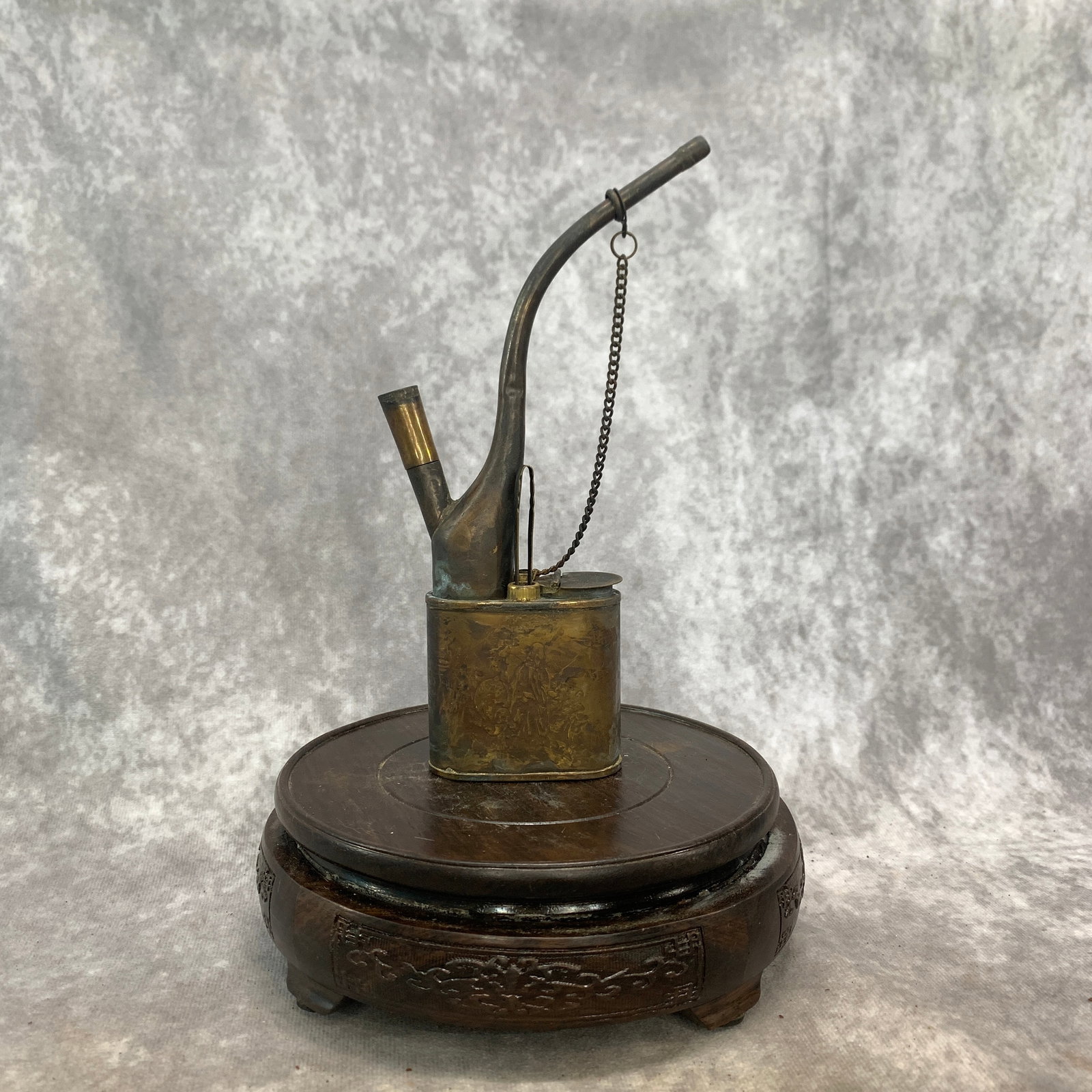 REPUBLIC-PERIOD BRASS WATER PIPE: Republic Period; Long: 3 inch; Width: 1.2 inch; High: 7.6 inch; . Wooden base for display only