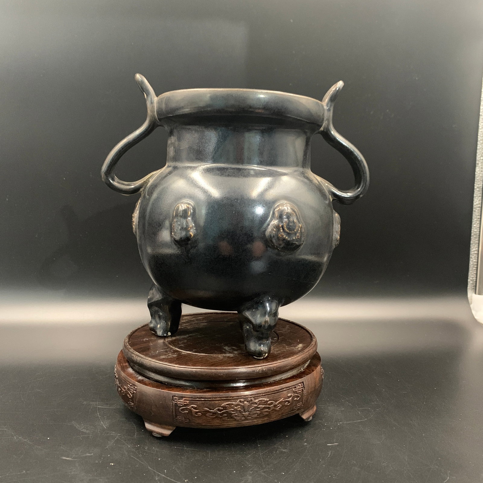 BLACK-GLAZED PORCELAIN TRIPOD CENSER