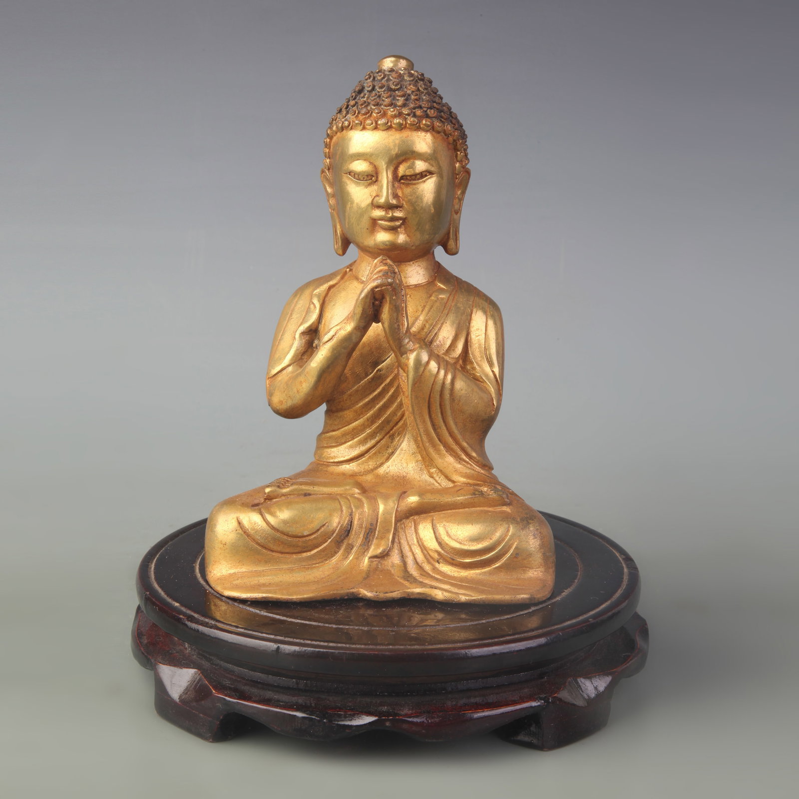 A FINE BRONZE SAKYAMUNI BUDDHA FIGURE: Qing Dynasty; High: 6.6 inch. Wooden base for display only