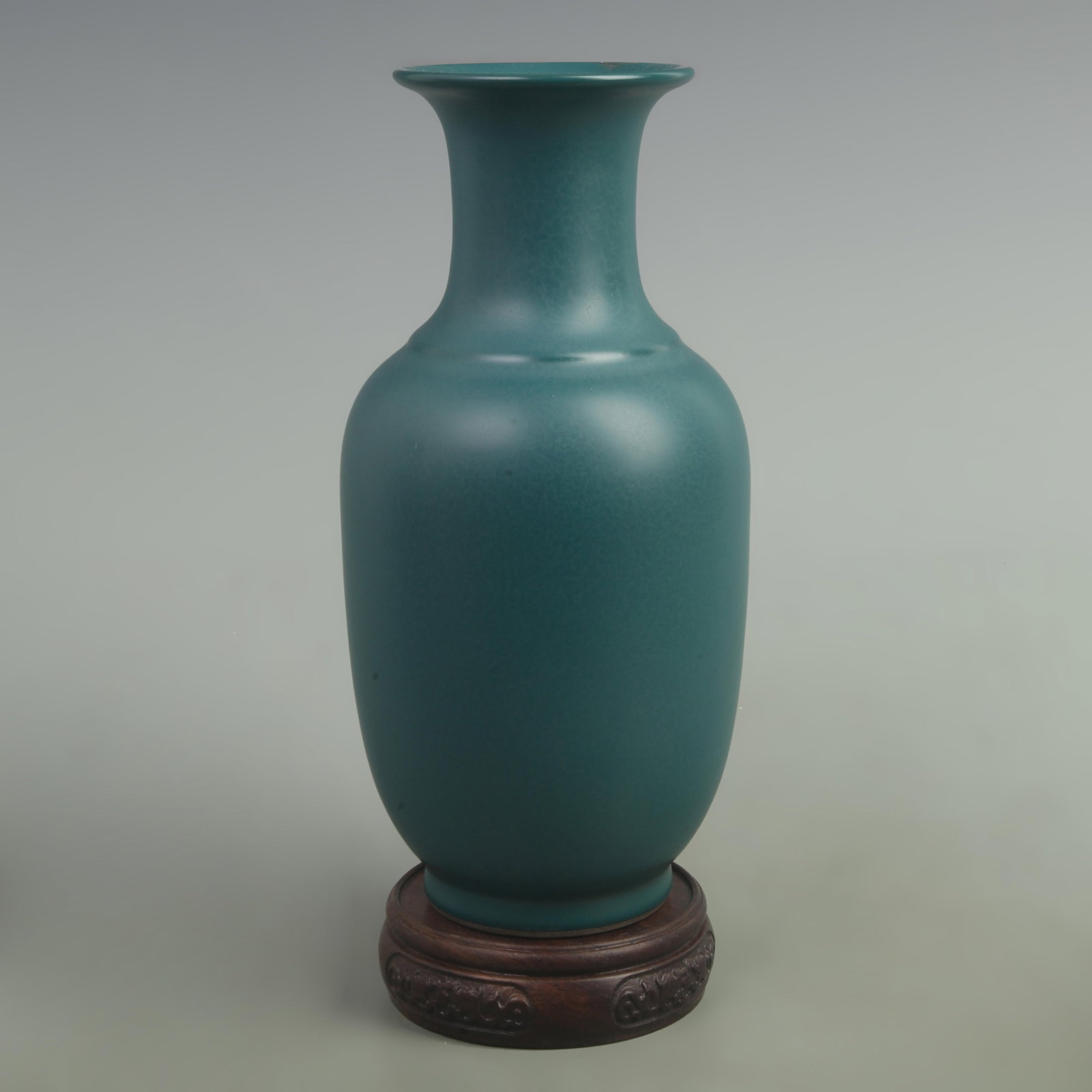 PEACOCK BLUE GLAZE WINTER MELON STYLE PORCELAIN VASE: Qing Dynasty Yongzhen Period: High: 9.5 inch; Width: 5.5 inch. Wooden base for display only