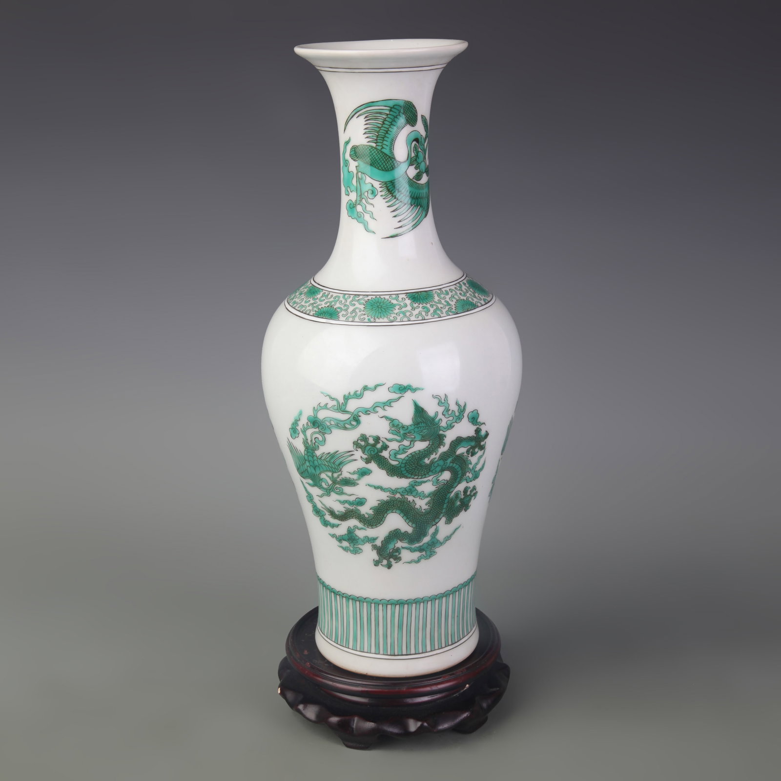DRAGON AND PHOENIX RESERVE-PANEL APPRECIATION VASE: Qing Dynasty Yong Zheng Period; D: 3.4 in ; High: 12.9 in. Wooden base for display only