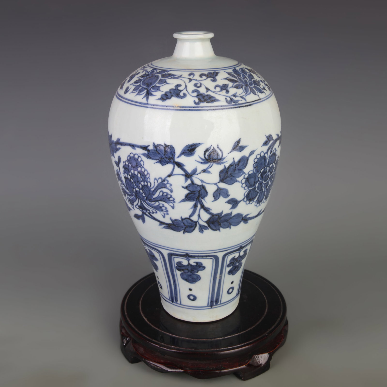 A BLUE AND WHITE FLORAL PLUM PORCELAIN VASE