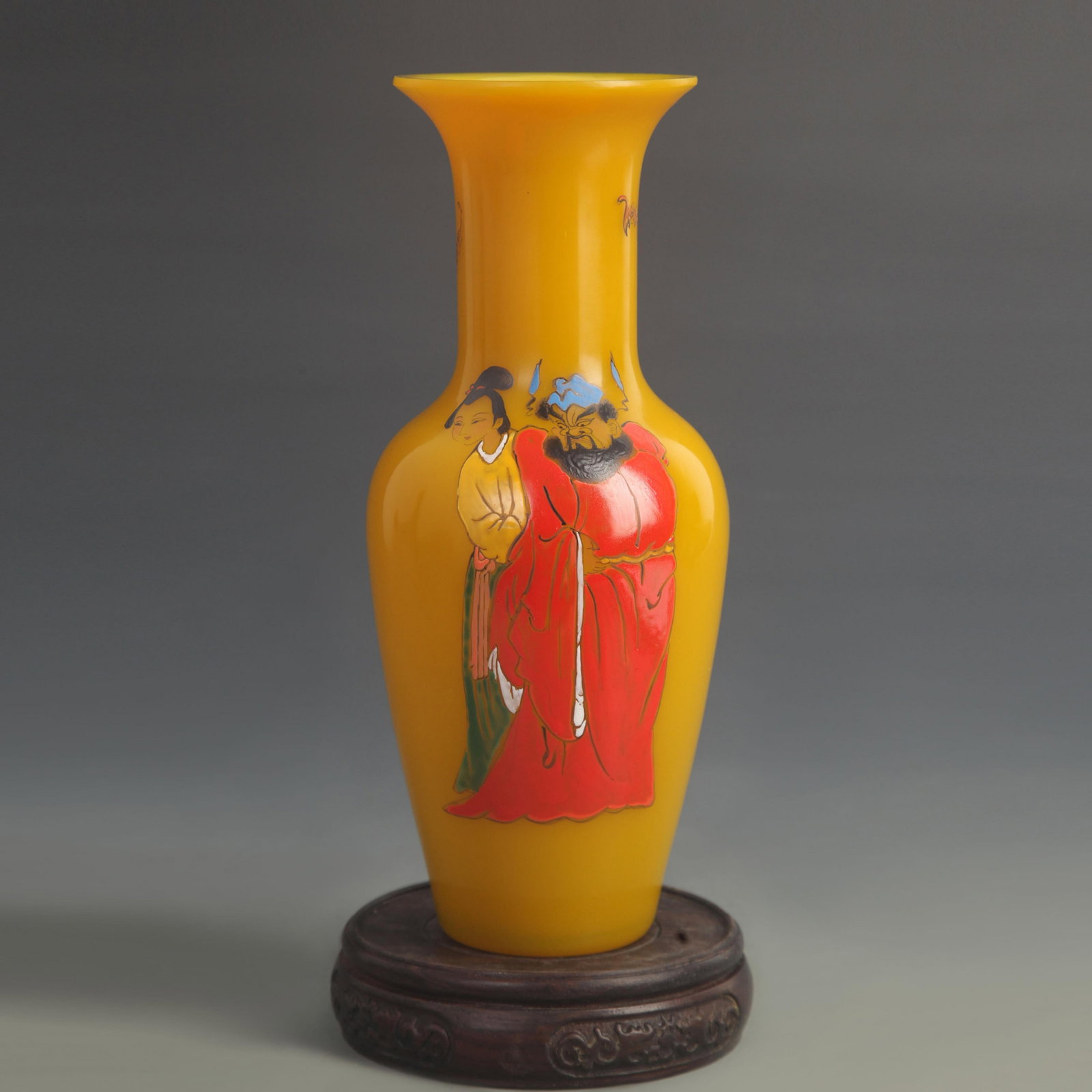 A FINE YELLOW GROUND ZHONG KUI PAINTED PORCELAIN BOTTLE: Qing Dynasty Qian Long Period; High: 8.75 inch; Diameter: 3.00 inch; . Wooden base for display only