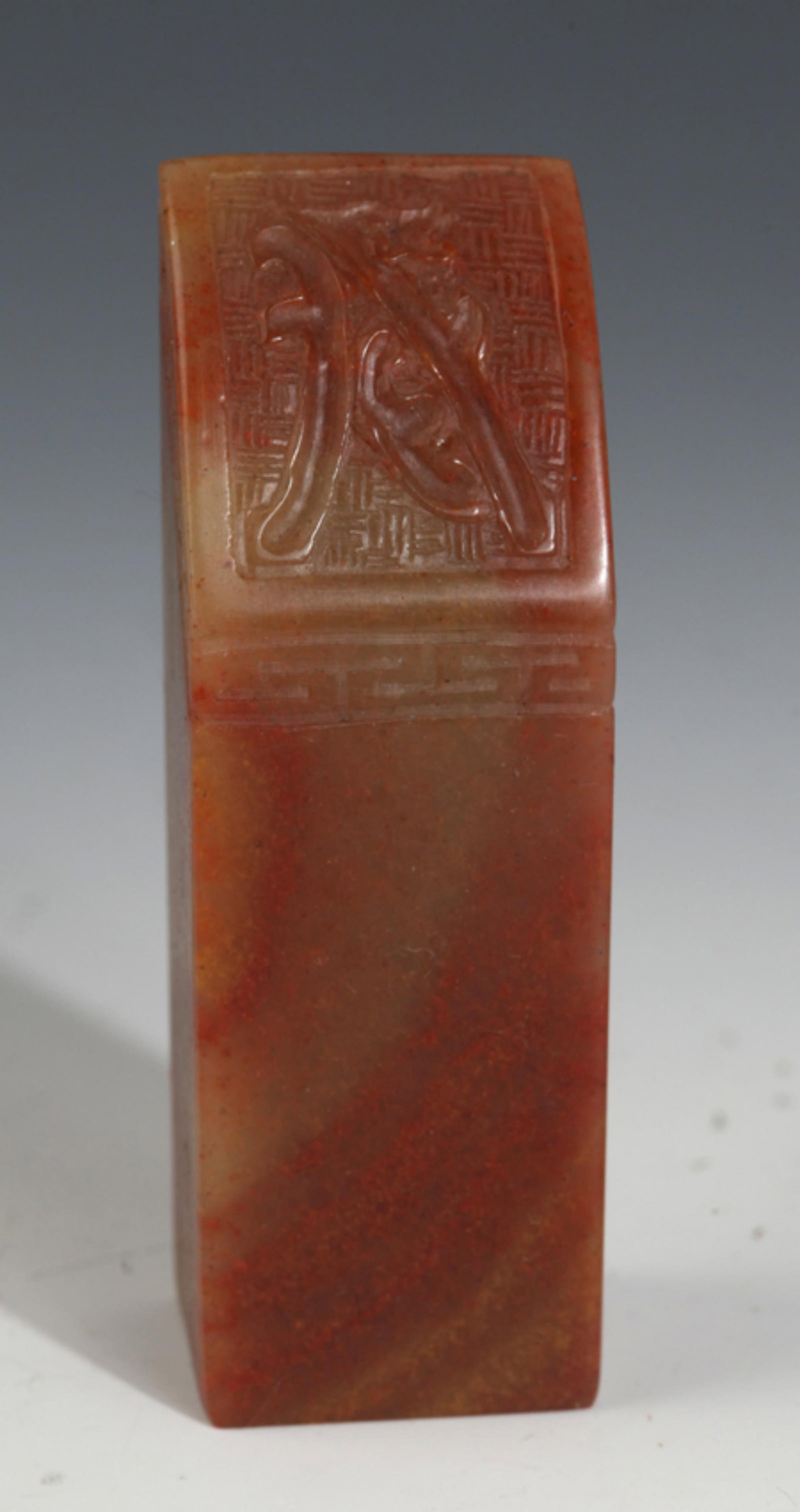 A FINE CARVED SHOUSHAN STONE SEAL: 20th Century; High: 3.4 inch; Width: 1.1 inch; . Wooden base for display only