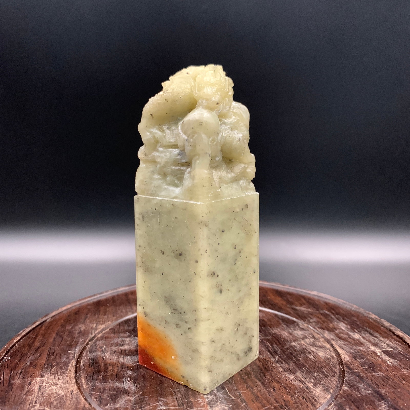 A FINELY CARVED SHOUSHAN STONE SEAL WITH PIXIU TOP: Modern; Long: 1.18 inch; Width: 1.18 inch; High: 3.9 inch; . Wooden base for display only