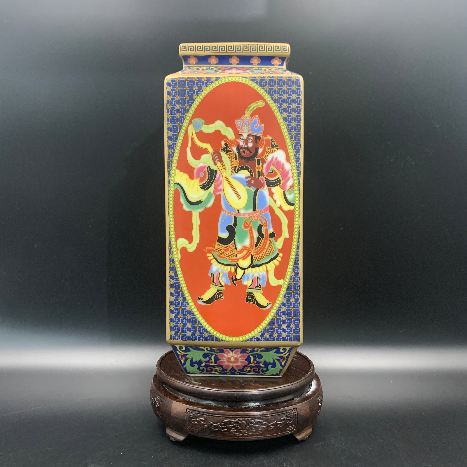 QUADRANGLE ENAMELED VAJRA GUARDIAN CONG STYLE PORCELAIN VASE: Qing Dynasty; Long: 5.1 inch; Width: 4.9 inch; High: 11.6 inch; . Wooden base for display only