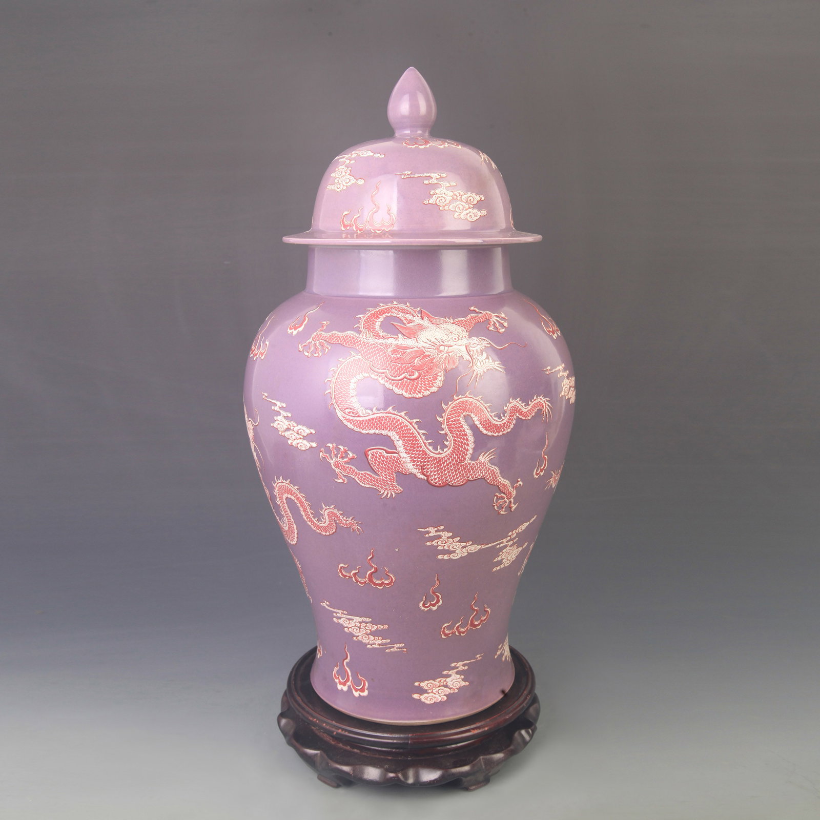 FAMILLE-ROSE PURPLE-GROUND DRAGON PATTERN PORCELAIN GINGER JAR: Qing Dynasty Kang Xi Period; High: 17.0inch; D: 7.80inch. Wooden base for display only