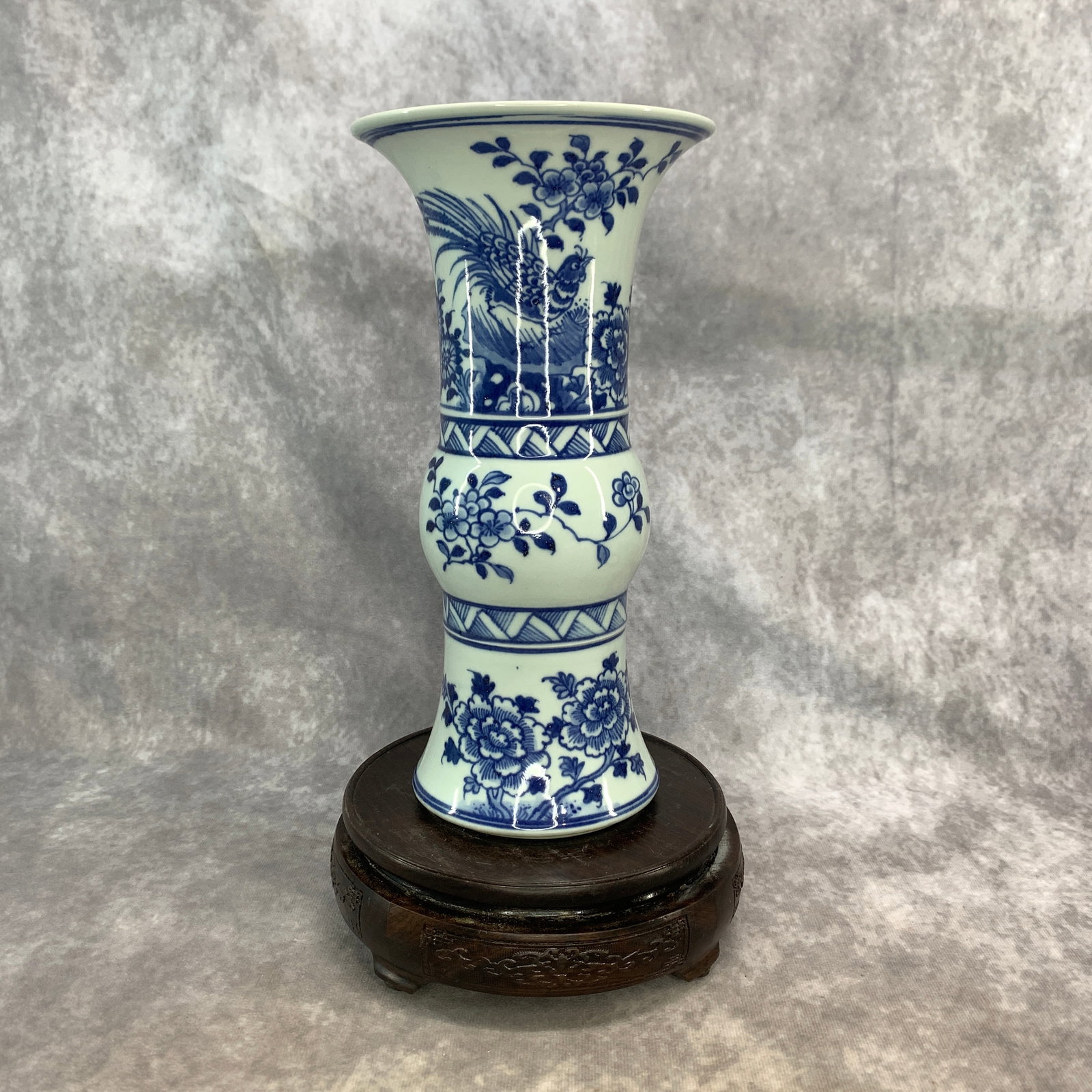 FAMILLE ROSE PALE GREEN-GROUND "BOGU" VASE: Qing Dynasty; High: 10 inch; Diameter: 5.1 inch; . Wooden base for display only