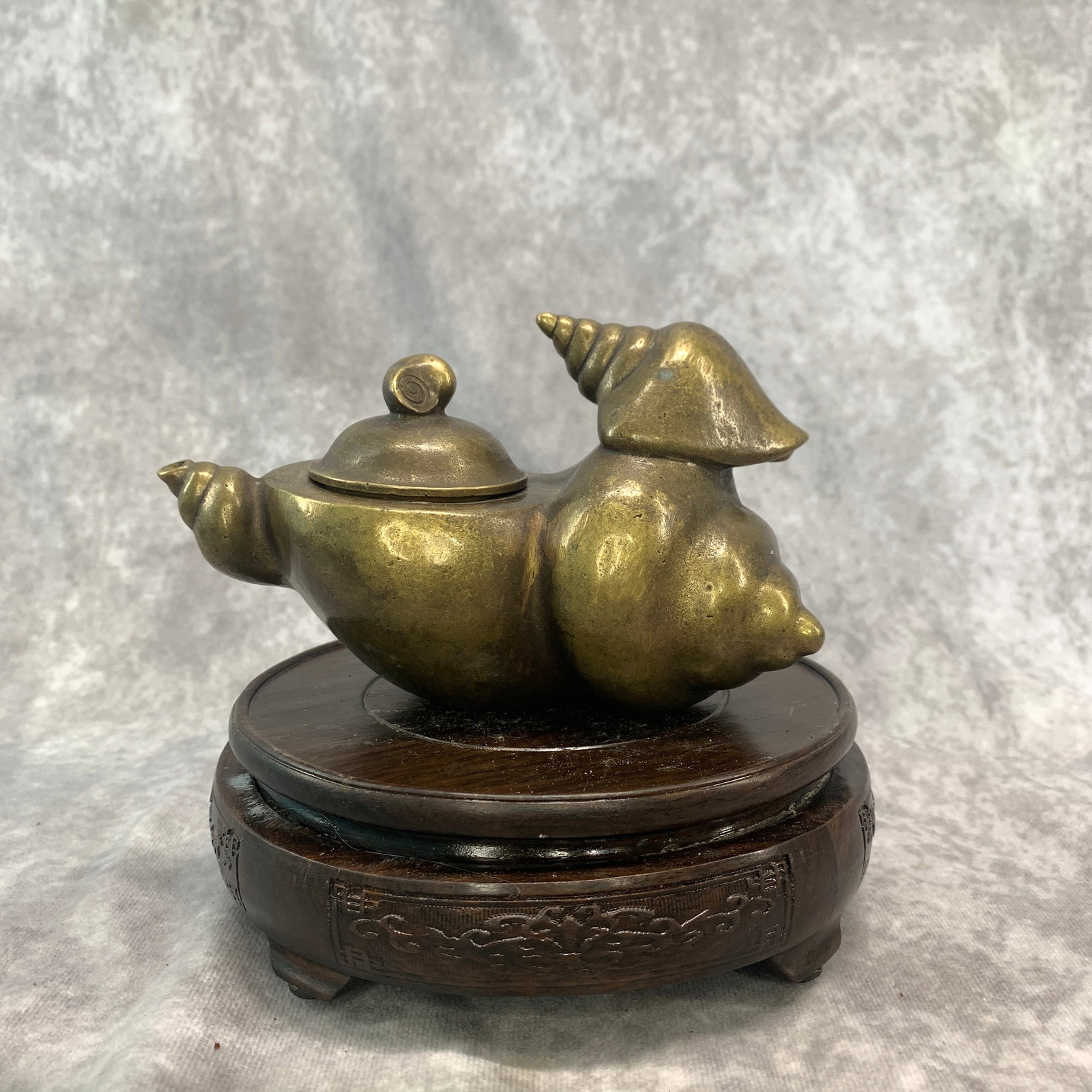 A FINE BRONZE CONCH SHELL-FORM TEAPOT